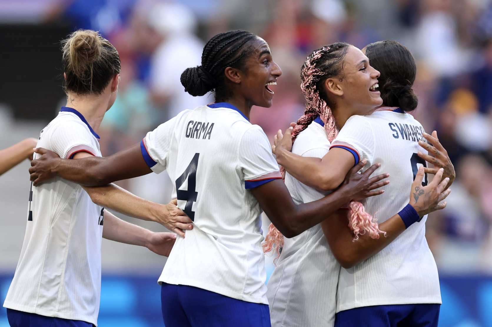 MARSEILLE, FRANCE - JULY 31: Trinity Rodman #5 of Team United States celebrates with teammates after scoring her team's first goal during the Women's group B match between Australia and United States during the Olympic Games Paris 2024 at Stade de Marseille on July 31, 2024 in Marseille, France. (Photo by Alex Livesey/Getty Images)