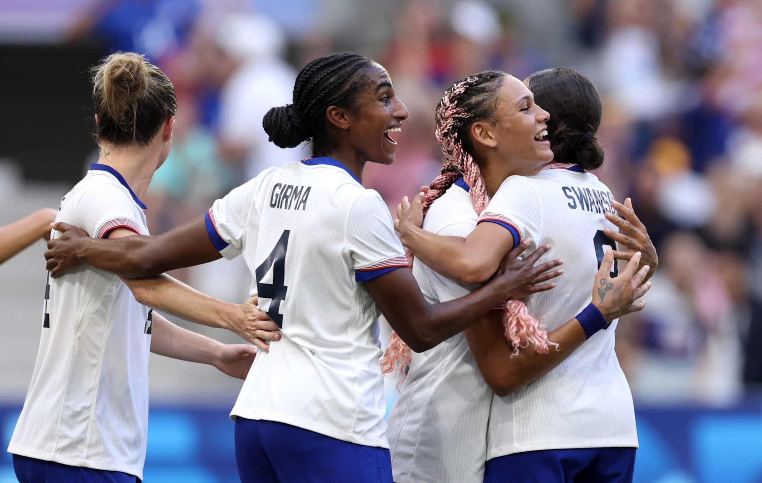 MARSEILLE, FRANCE - JULY 31: Trinity Rodman #5 of Team United States celebrates with teammates after scoring her team's first goal during the Women's group B match between Australia and United States during the Olympic Games Paris 2024 at Stade de Marseille on July 31, 2024 in Marseille, France. (Photo by Alex Livesey/Getty Images)