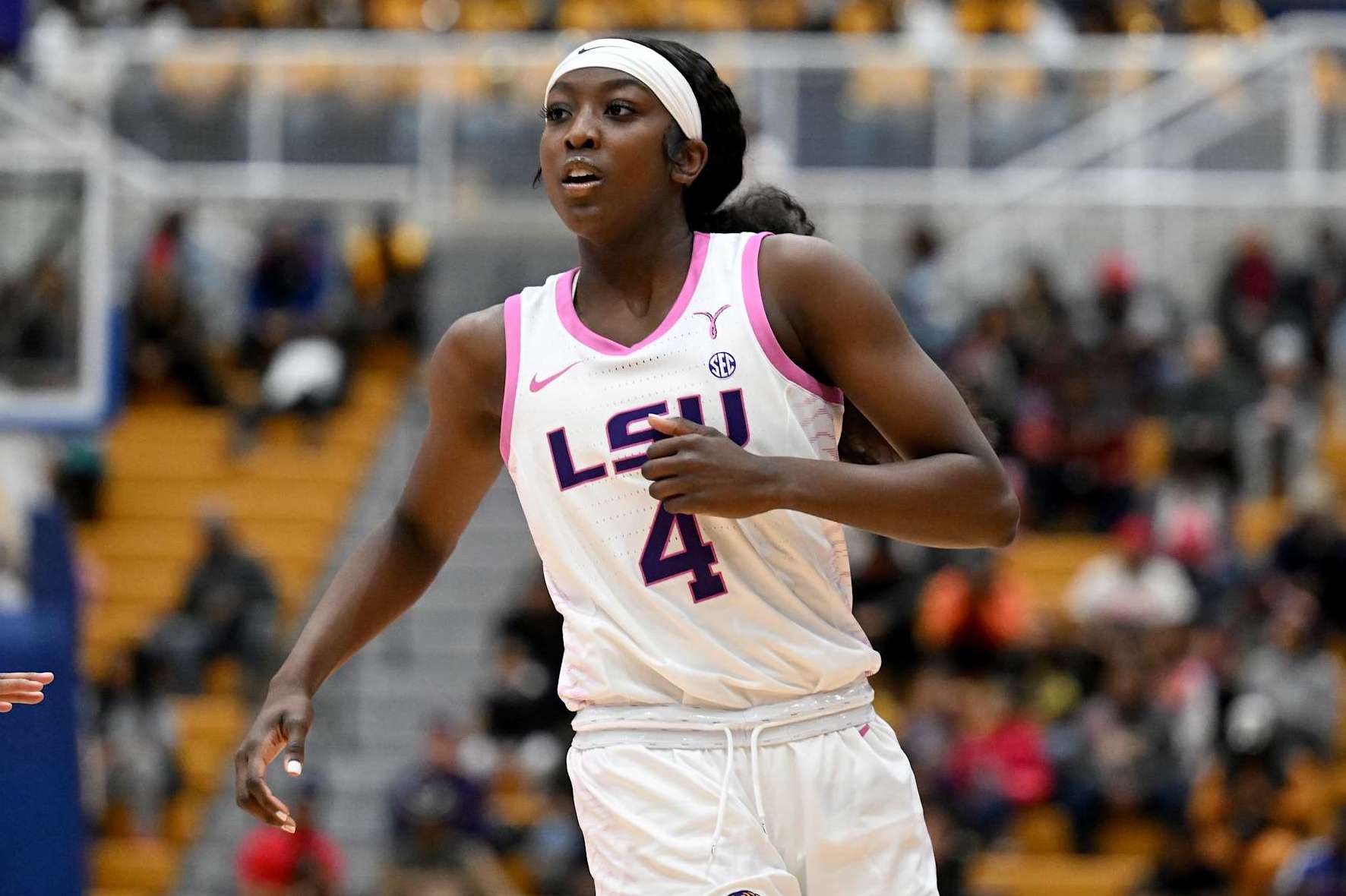 BALTIMORE, MARYLAND - DECEMBER 20: Flau'jae Johnson #4 of the LSU Lady Tigers plays against the Coppin State Eagles at Coppin State University on December 20, 2023 in Baltimore, Maryland. (Photo by G Fiume/Getty Images)