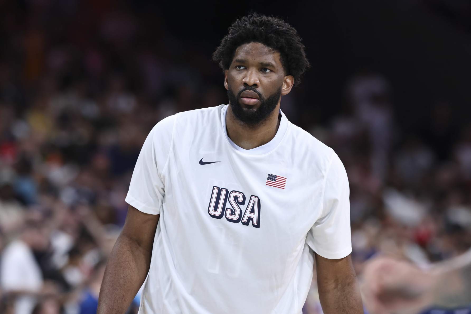 LILLE, FRANCE - JULY 28: Joel Embiid #11 of Team USA warms up before the Men's Group Phase - Group C match between Serbia and USA on Day 2 of the Olympic Games Paris 2024 at Stade Pierre Mauroy on July 28, 2024 in Lille, France. (Photo by Catherine Steenkeste/Getty Images)