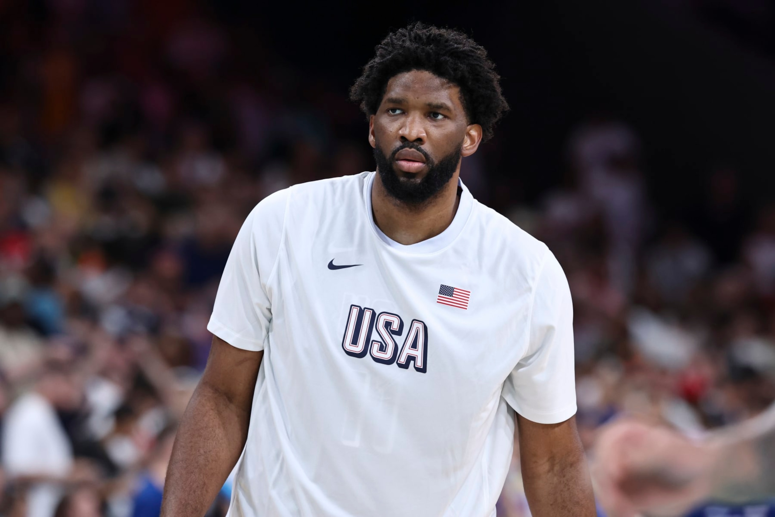 LILLE, FRANCE - JULY 28: Joel Embiid #11 of Team USA warms up before the Men's Group Phase - Group C match between Serbia and USA on Day 2 of the Olympic Games Paris 2024 at Stade Pierre Mauroy on July 28, 2024 in Lille, France. (Photo by Catherine Steenkeste/Getty Images)