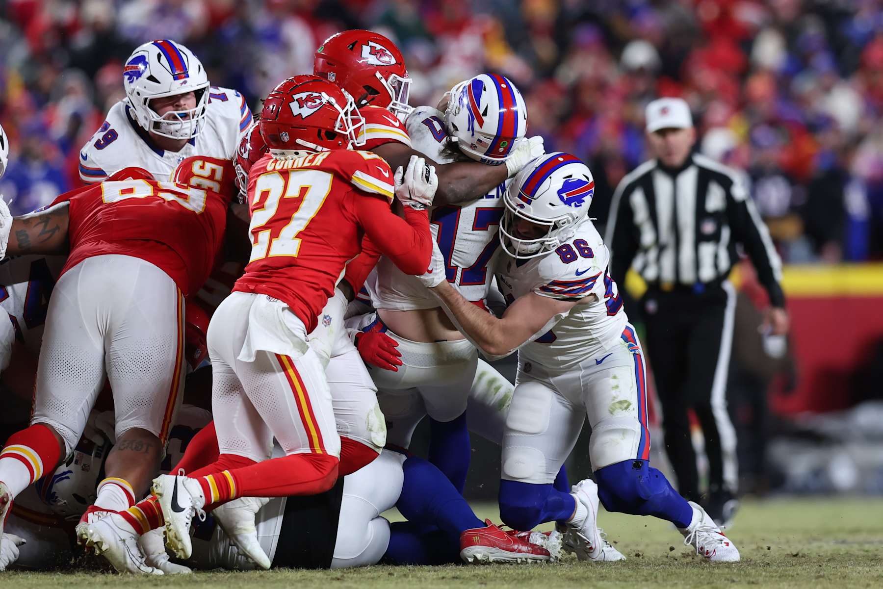 KANSAS CITY, MO - JANUARY 26: The Kansas City Chiefs defense holds Buffalo Bills quarterback Josh Allen (17) just short of the line of gain on a critical fourth down in the fourth quarter of the AFC Championship game between the Buffalo Bills and Kansas City Chiefs on January 26, 2025 at GEHA Field at Arrowhead Stadium in Kansas City, MO. (Photo by Scott Winters/Icon Sportswire via Getty Images)
