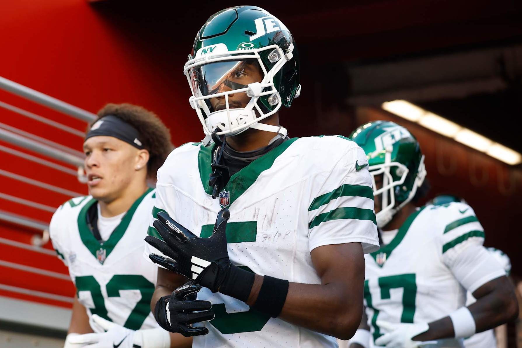 SANTA CLARA, CALIFORNIA - SEPTEMBER 09: Wide receiver Garrett Wilson #5 (C) of the New York Jets comes out of the tunnel with teammates for the second half of the game against the San Francisco 49ers at Levi's Stadium on September 09, 2024 in Santa Clara, California. (Photo by Lachlan Cunningham/Getty Images)