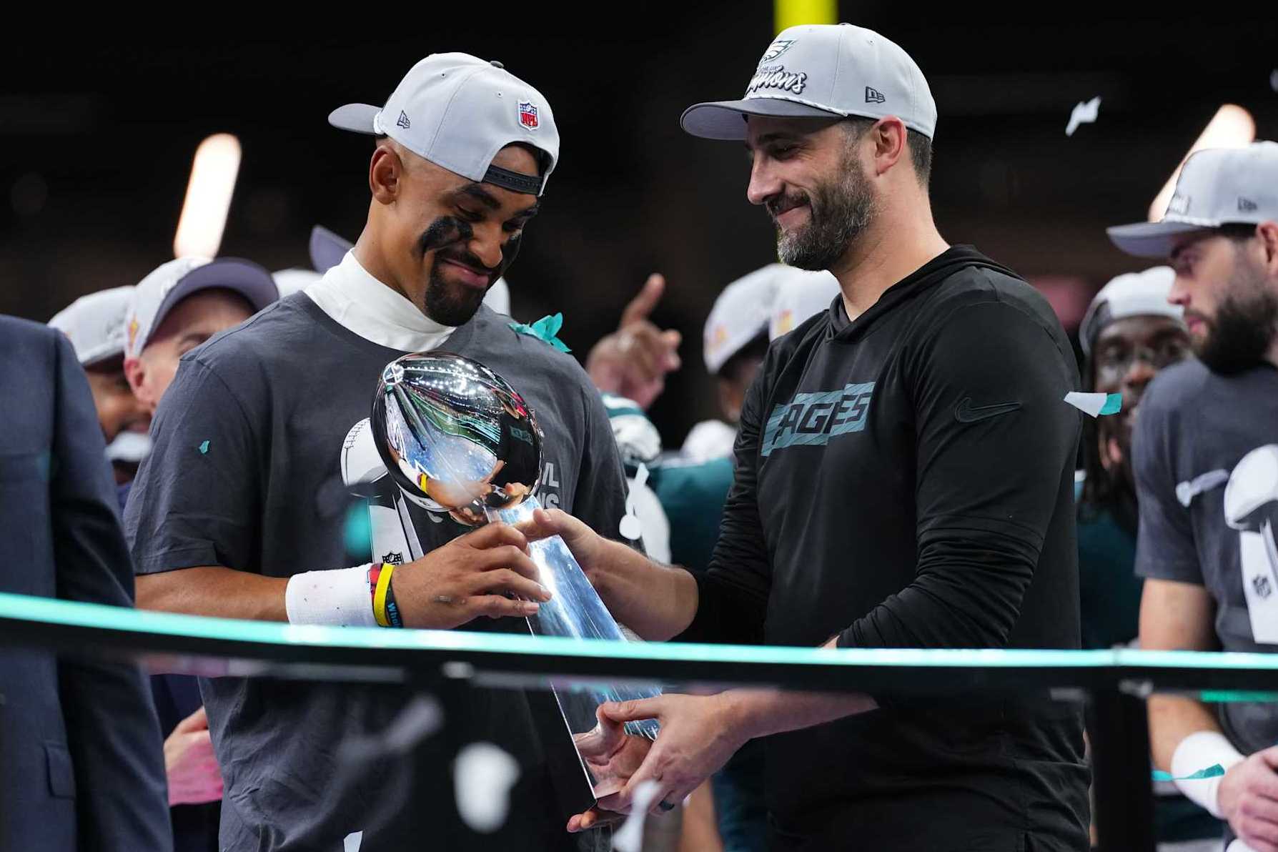 NEW ORLEANS, LA - FEBRUARY 09: Jalen Hurts #1 of the Philadelphia Eagles and head coach Nick Sirianni celebrate with the Lombardi Trophy after defeating the Kansas City Chiefs during Super Bowl LIX at Caesars Superdome on February 9, 2025 in New Orleans, Louisiana. (Photo by Cooper Neill/Getty Images)