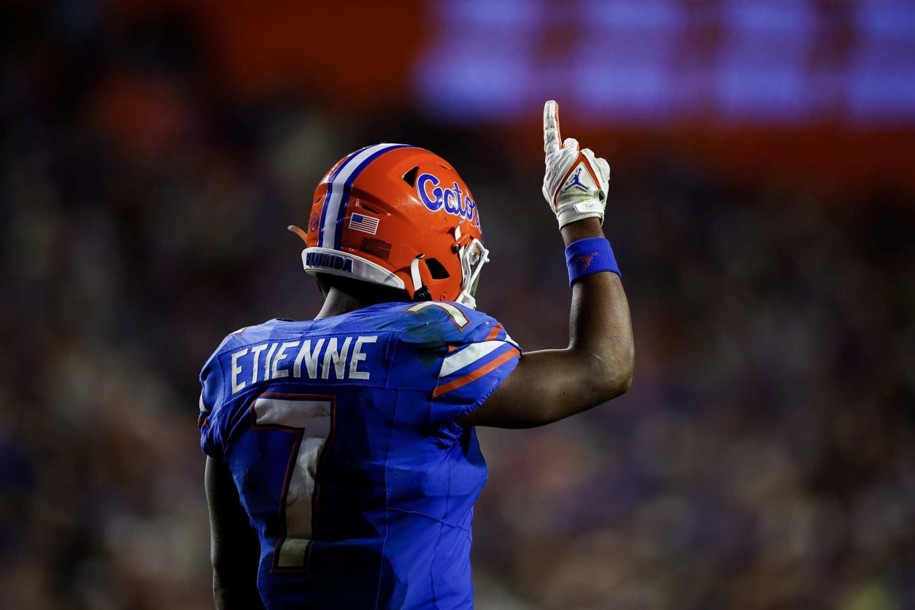 GAINESVILLE, FLORIDA - NOVEMBER 25: Trevor Etienne #7 of the Florida Gators ges during the first half of a game against the Florida State Seminoles at Ben Hill Griffin Stadium on November 25, 2023 in Gainesville, Florida. (Photo by James Gilbert/Getty Images)