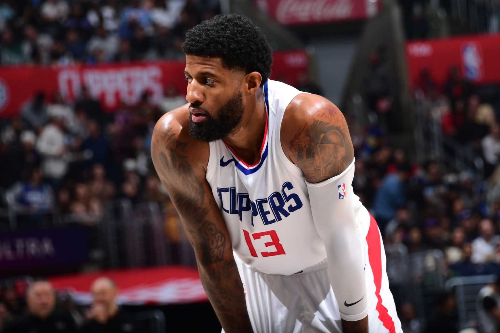 LOS ANGELES, CA - APRIL 4: Paul George #13 of the LA Clippers looks on during the game against the Denver Nuggets on April 4, 2024 at Crypto.Com Arena in Los Angeles, California. NOTE TO USER: User expressly acknowledges and agrees that, by downloading and/or using this Photograph, user is consenting to the terms and conditions of the Getty Images License Agreement. Mandatory Copyright Notice: Copyright 2024 NBAE (Photo by Adam Pantozzi/NBAE via Getty Images)