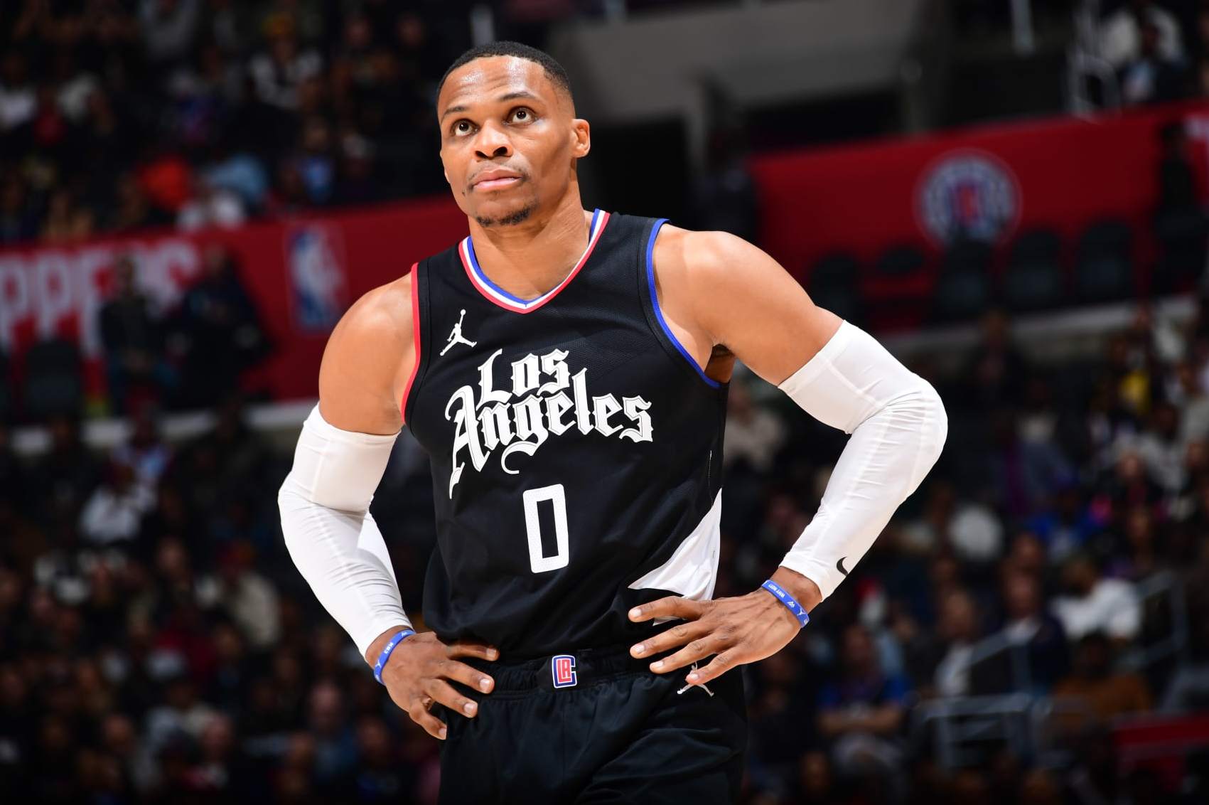 LOS ANGELES, CA - DECEMBER 6: Russell Westbrook #0 of the LA Clippers looks on during the game on December 6, 2023 at Crypto.Com Arena in Los Angeles, California. NOTE TO USER: User expressly acknowledges and agrees that, by downloading and/or using this Photograph, user is consenting to the terms and conditions of the Getty Images License Agreement. Mandatory Copyright Notice: Copyright 2023 NBAE (Photo by Adam Pantozzi/NBAE via Getty Images)