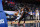 PHILADELPHIA, PA - APRIL 19: Stephen Curry #30 of the Golden State Warriors handles the ball against Joel Embiid #21 of the Philadelphia 76ers on April 19, 2021 at Wells Fargo Center in Philadelphia, Pennsylvania. NOTE TO USER: User expressly acknowledges and agrees that, by downloading and/or using this Photograph, user is consenting to the terms and conditions of the Getty Images License Agreement. Mandatory Copyright Notice: Copyright 2021 NBAE (Photo by Jesse D. Garrabrant/NBAE via Getty Images)