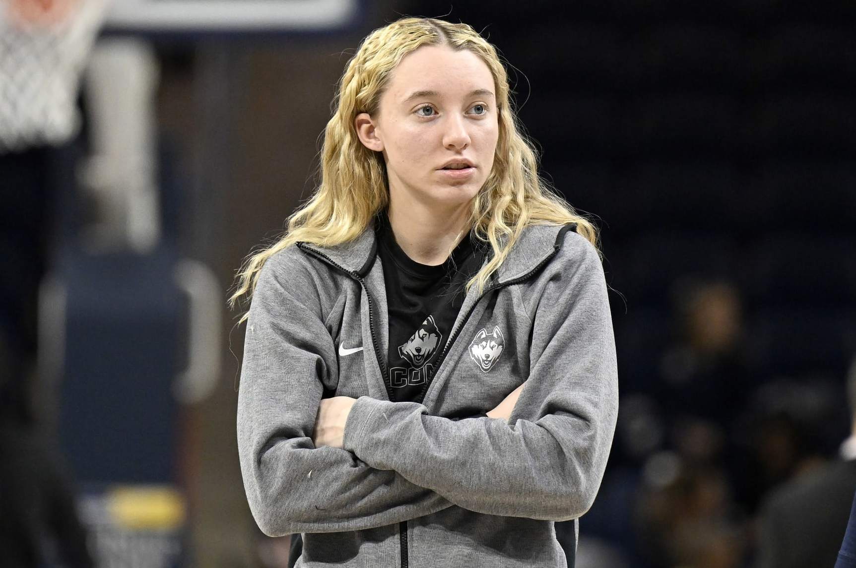WASHINGTON, DC - FEBRUARY 11: Paige Bueckers #5 of the UConn Huskies watches the teams warm up before the game against the Georgetown Hoyas at Entertainment & Sports Arena on February 11, 2023 in Washington, DC. (Photo by G Fiume/Getty Images)