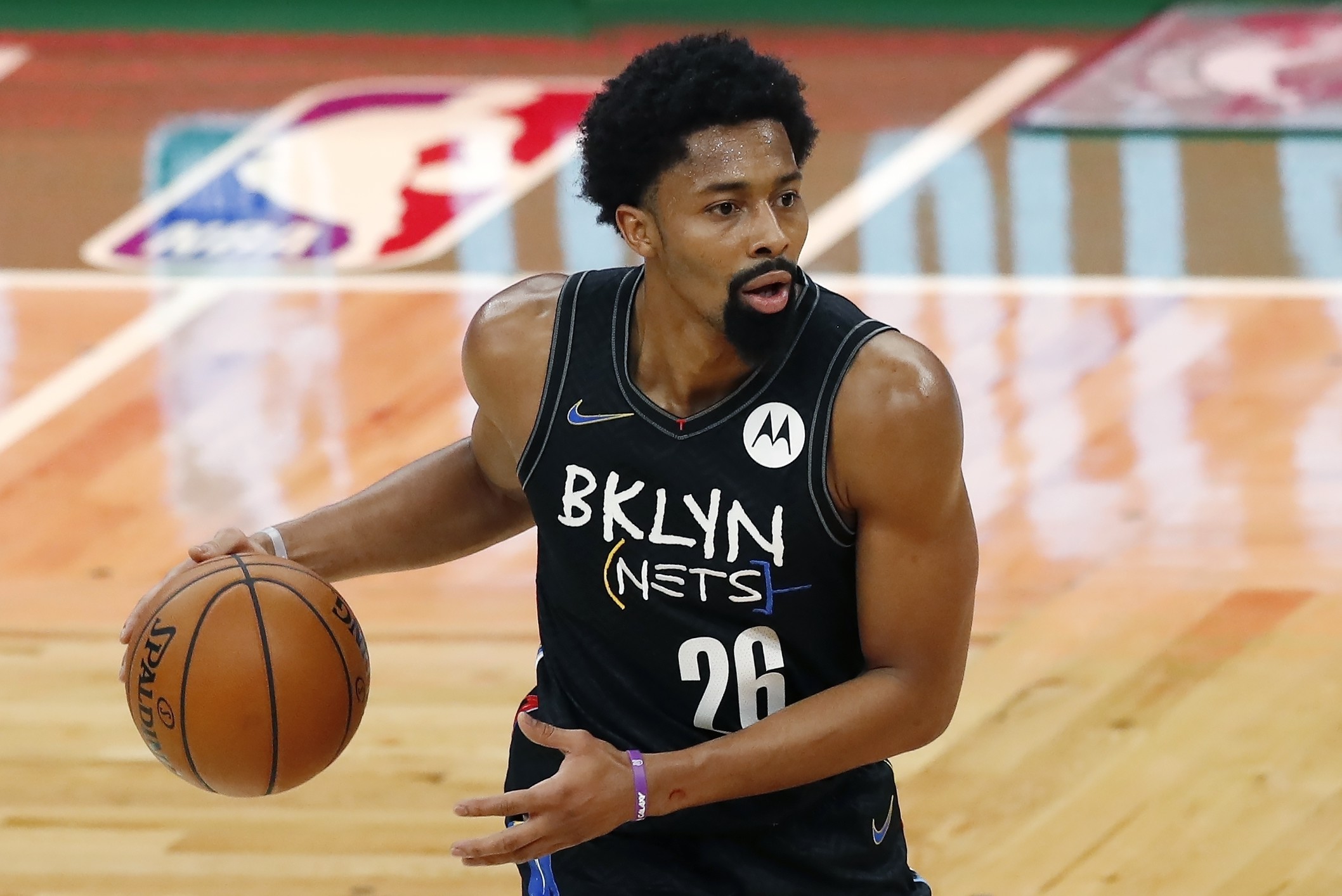 Brooklyn Nets' Spencer Dinwiddie plays against the Boston Celtics during the first half of an NBA basketball game, Friday, Dec. 25, 2020, in Boston. (AP Photo/Michael Dwyer)