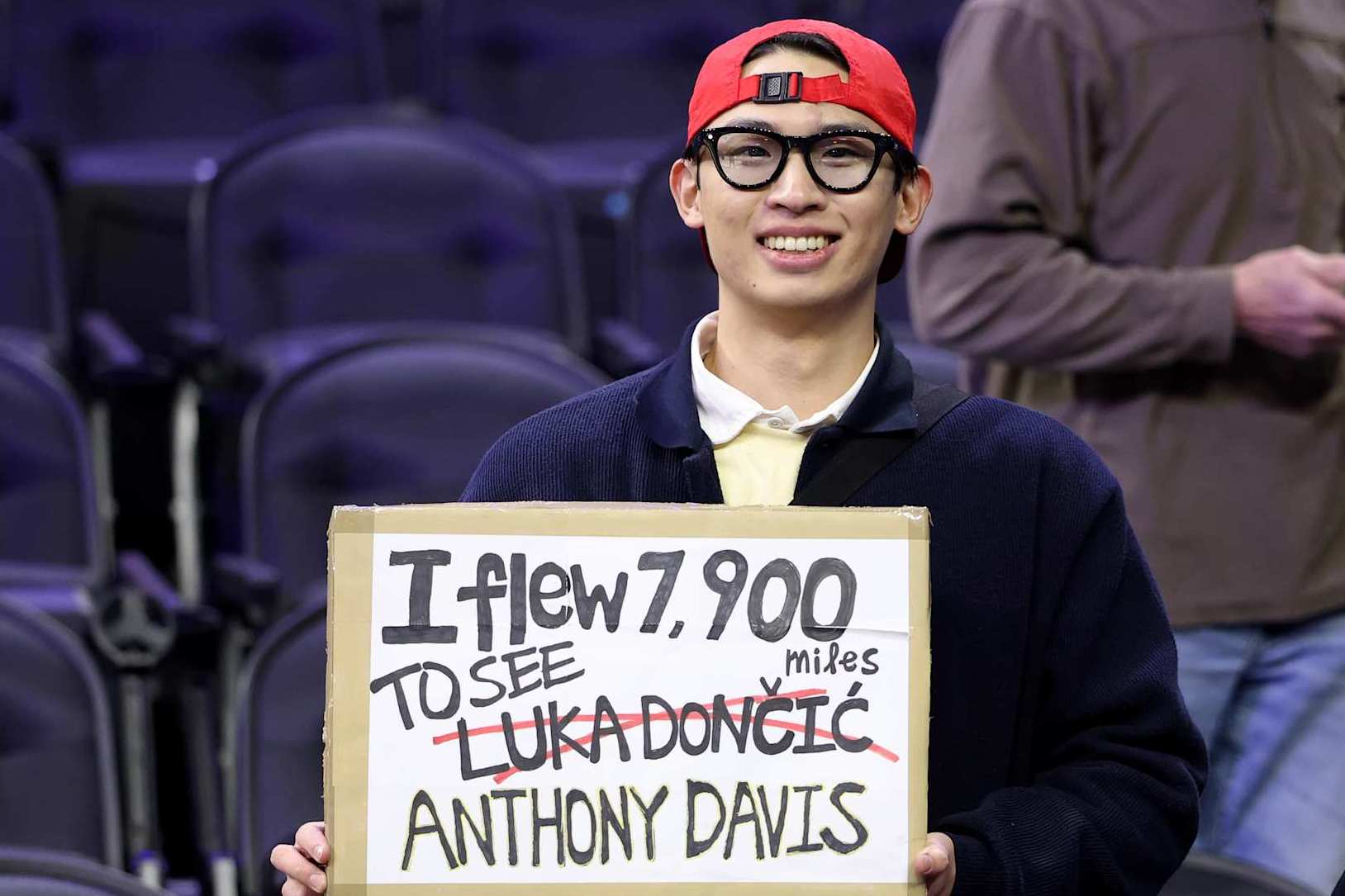 PHILADELPHIA, PENNSYLVANIA - FEBRUARY 04: A fan holds a sign for Luka Doncic and Anthony Davis during warmups prior to a game between the Philadelphia 76ers and Dallas Mavericks at the Wells Fargo Center on February 04, 2025 in Philadelphia, Pennsylvania. NOTE TO USER: User expressly acknowledges and agrees that, by downloading and or using this photograph, User is consenting to the terms and conditions of the Getty Images License Agreement. (Photo by Emilee Chinn/Getty Images)