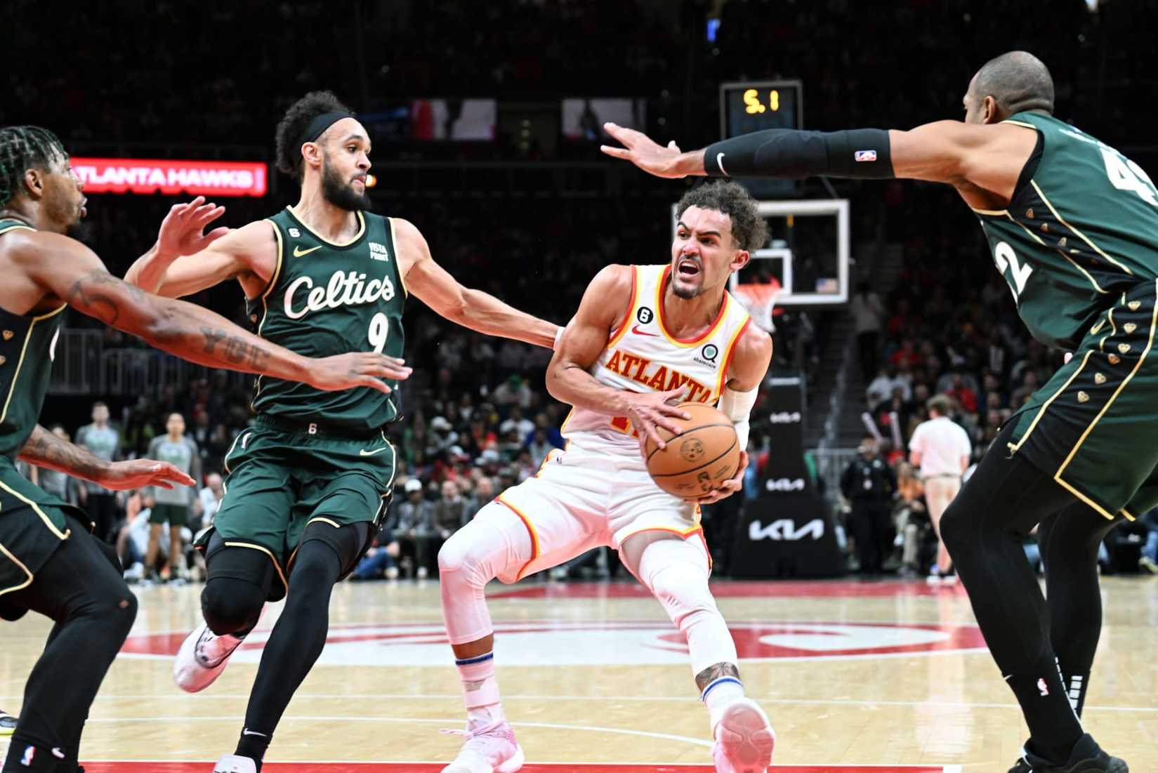 ATLANTA, GA - MARCH 11: Trae Young #11 of the Atlanta Hawks drives to the basket against the Boston Celtics on March 11, 2023, at State Farm Arena in Atlanta, Georgia. NOTE TO USER: User expressly acknowledges and agrees that, by downloading and/or using this Photograph, user is consenting to the terms and conditions of the Getty Images License Agreement. Mandatory Copyright Notice: Copyright 2023 NBAE (Photo by Adam Hagy/NBAE via Getty Images) ATLANTA, GA - MARCH 11: Trae Young #11 of the Atlanta Hawks drives to the basket against the Boston Celtics on March 11, 2023, at State Farm Arena in Atlanta, Georgia. NOTE TO USER: User expressly acknowledges and agrees that, by downloading and/or using this Photograph, user is consenting to the terms and conditions of the Getty Images License Agreement. Mandatory Copyright Notice: Copyright 2023 NBAE (Photo by Adam Hagy/NBAE via Getty Images)