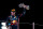 ABU DHABI, UNITED ARAB EMIRATES - NOVEMBER 26: Max Verstappen of Netherlands and Oracle Red Bull Racing celebrates on the podium during the F1 Grand Prix of Abu Dhabi at Yas Marina Circuit on November 26, 2023 in Abu Dhabi, United Arab Emirates. (Photo by James Gasperotti/Ciancaphoto Studio/Getty Images)