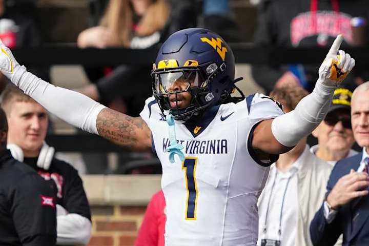 CINCINNATI, OHIO - NOVEMBER 09: Garnett Hollis Jr. #1 of the West Virginia Mountaineers reacts after breaking up a pass intended for Xzavier Henderson #8 of the Cincinnati Bearcats in the first quarter at Nippert Stadium on November 09, 2024 in Cincinnati, Ohio. (Photo by Dylan Buell/Getty Images)