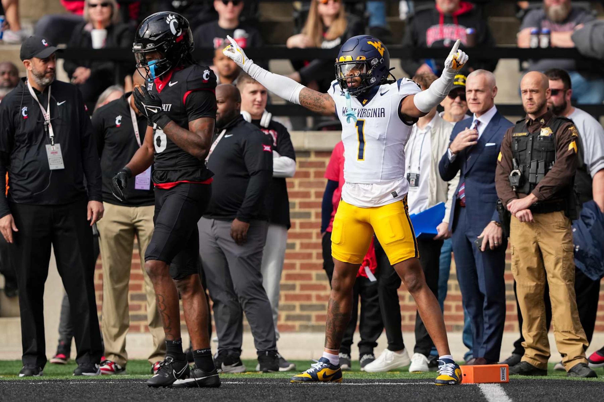 CINCINNATI, OHIO - NOVEMBER 09: Garnett Hollis Jr. #1 of the West Virginia Mountaineers reacts after breaking up a pass intended for Xzavier Henderson #8 of the Cincinnati Bearcats in the first quarter at Nippert Stadium on November 09, 2024 in Cincinnati, Ohio. (Photo by Dylan Buell/Getty Images)