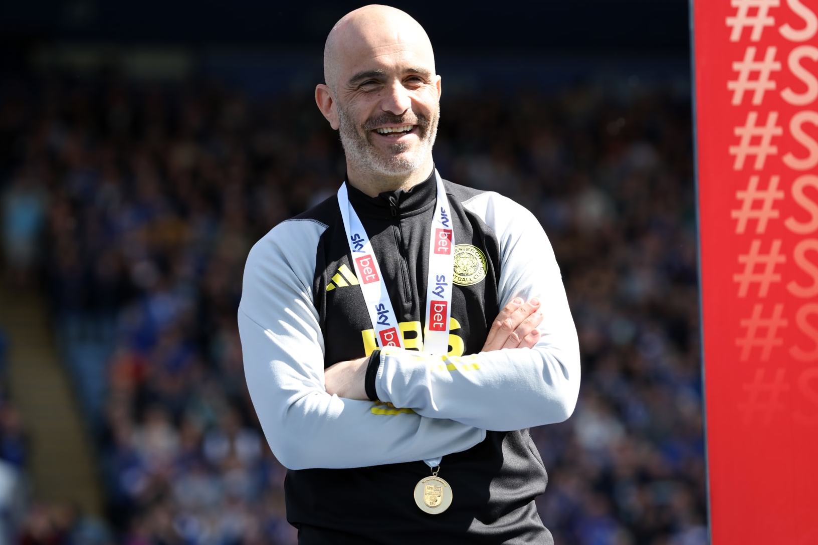 LEICESTER, ENGLAND - MAY 4: Leicester City Manager Enzo Maresca with his Sky Bet Championship medal after the Sky Bet Championship match between Leicester City and Blackburn Rovers at King Power Stadium on May 4, 2024 in Leicester, United Kingdom. (Photo by Plumb Images/Leicester City FC via Getty Images)