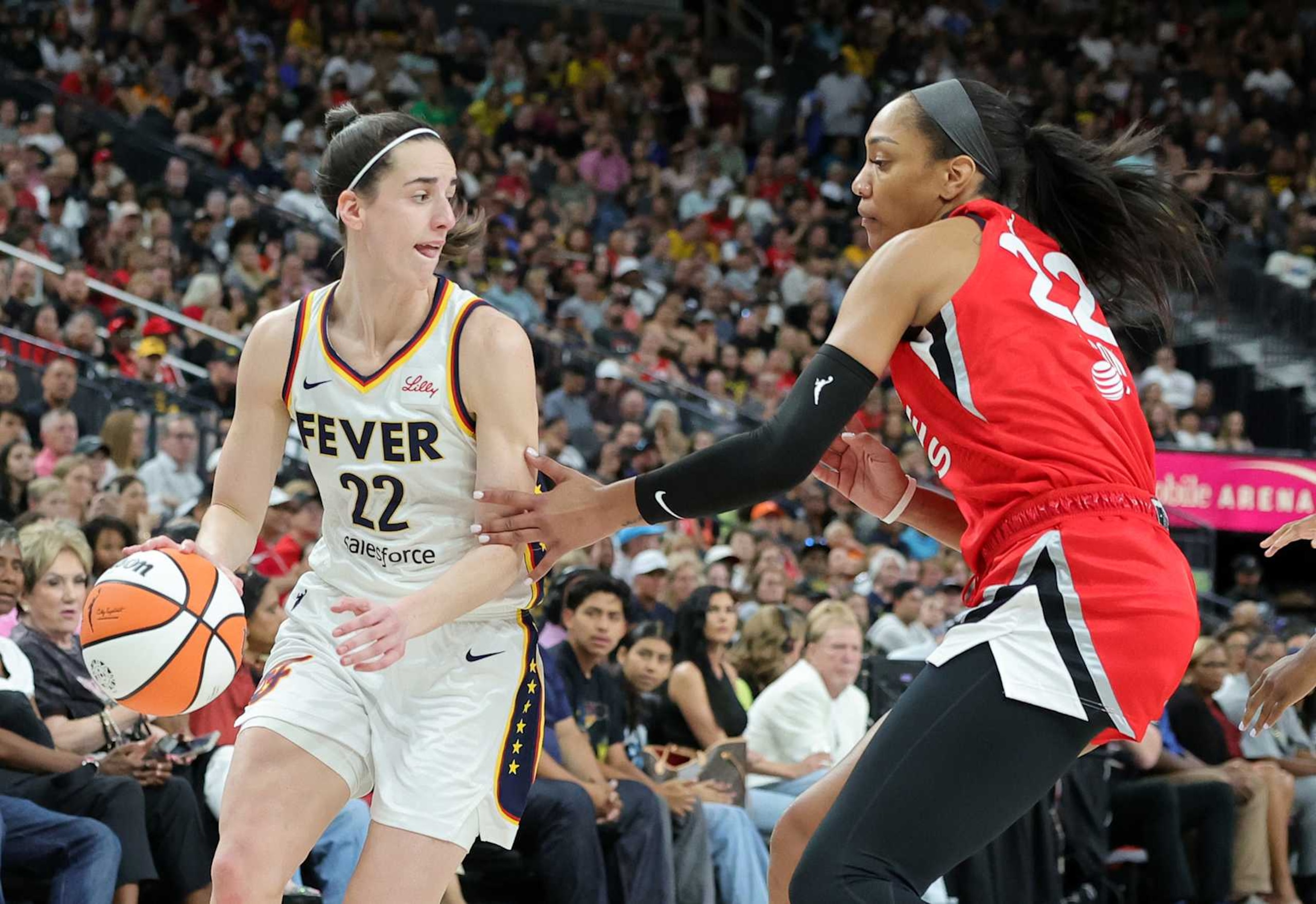 Caitlin Clark and A'ja Wilson