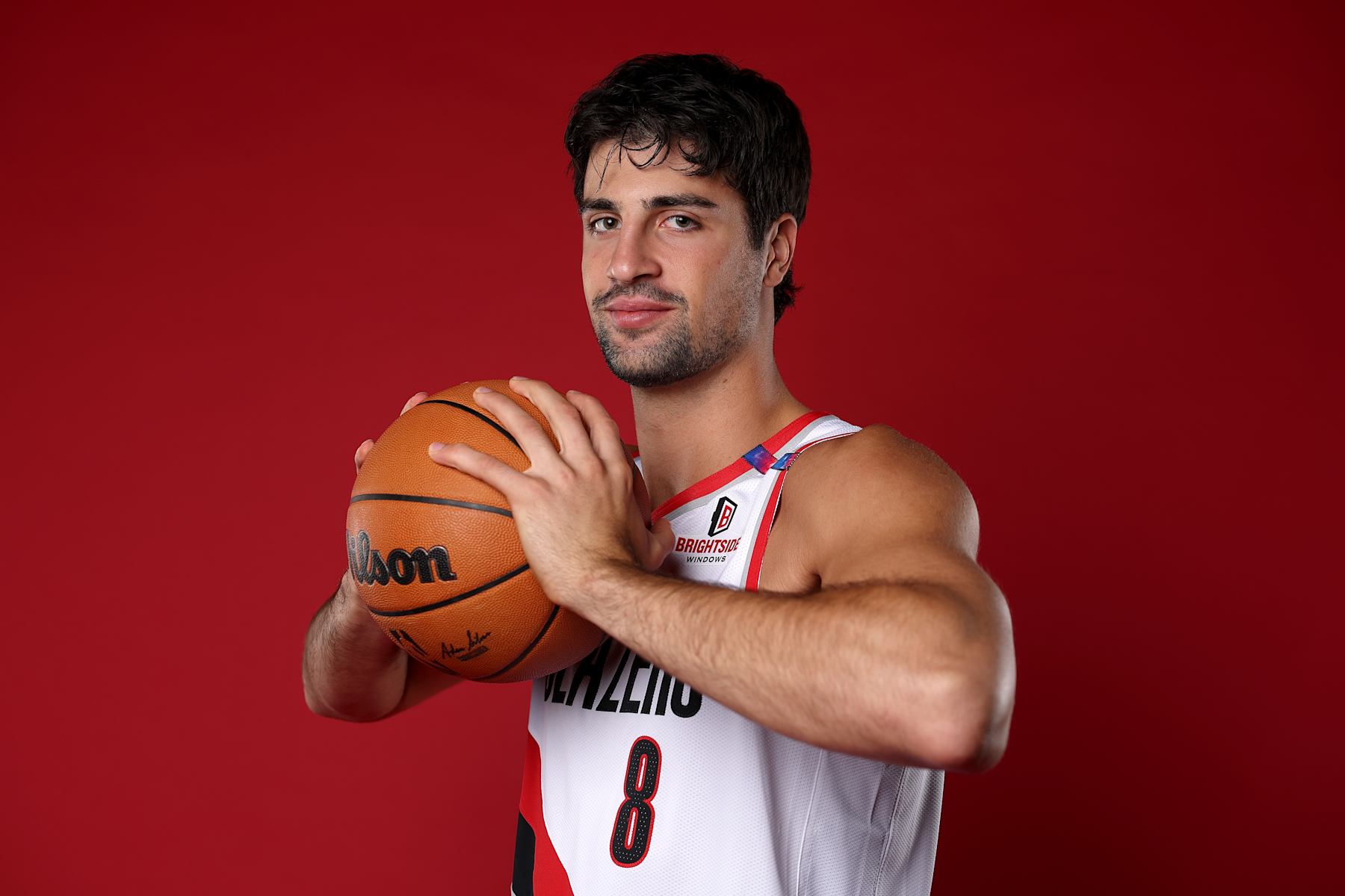 PORTLAND, OREGON - SEPTEMBER 30: Deni Avdija #8 of the Portland Trail Blazers poses for a portrait during Blazers Media Day at Veterans Memorial Coliseum on September 30, 2024 in Portland, Oregon. NOTE TO USER: User expressly acknowledges and agrees that, by downloading and/or using this photograph, user is consenting to the terms and conditions of the Getty Images License Agreement. (Photo by Steph Chambers/Getty Images)