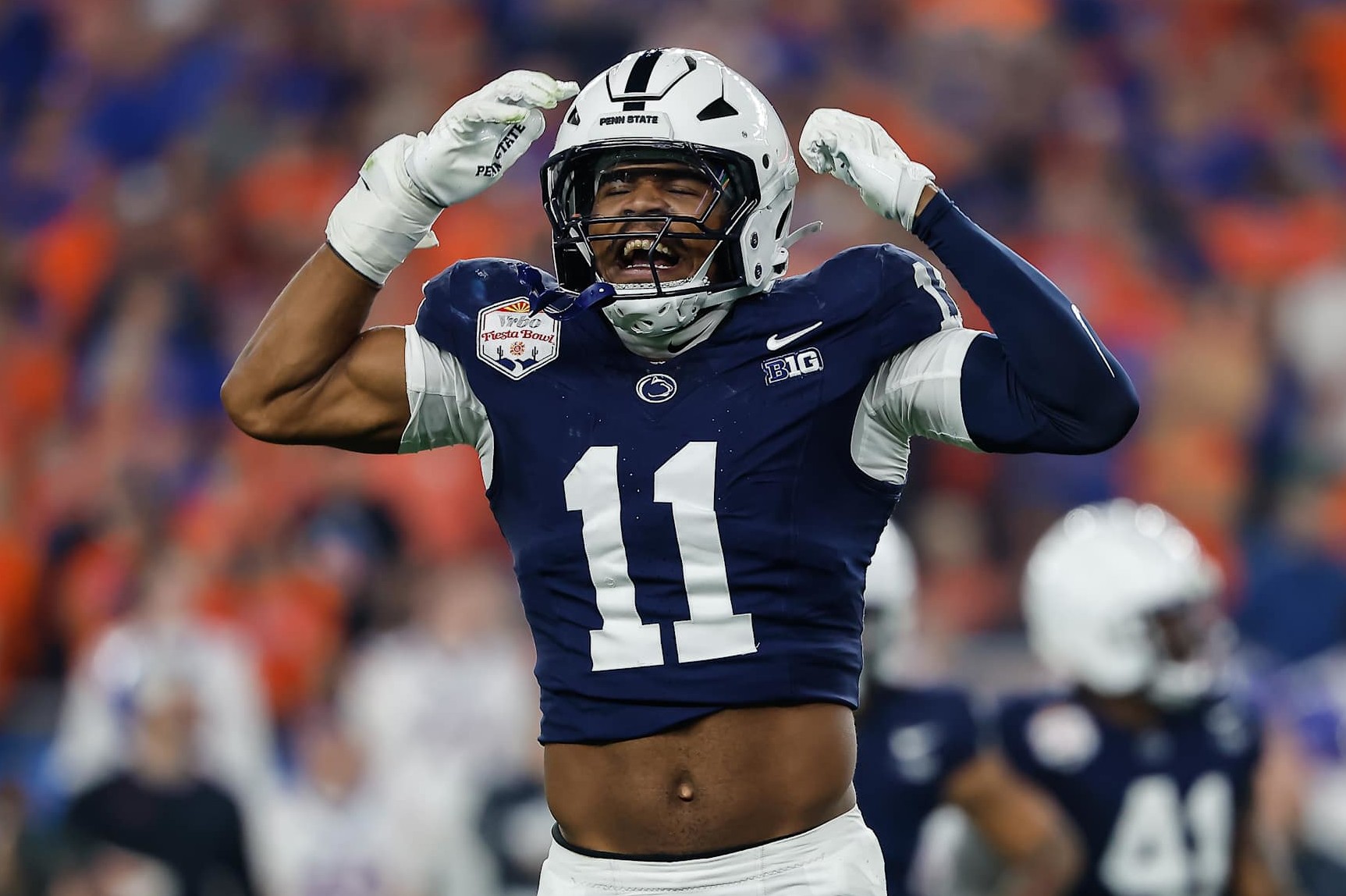 GLENDALE, AZ - DECEMBER 31:  Defensive End Abdul Carter #11 of the Penn State Nittany Lions reacts after a big play during the Penn State Nittany Lions versus Boise State Broncos College Football Playoff Quarterfinal at the Vrbo Fiesta Bowl on December 31,2024, at State Farm Stadium in Glendale, AZ.  (Photo by Kevin Abele/Icon Sportswire via Getty Images)