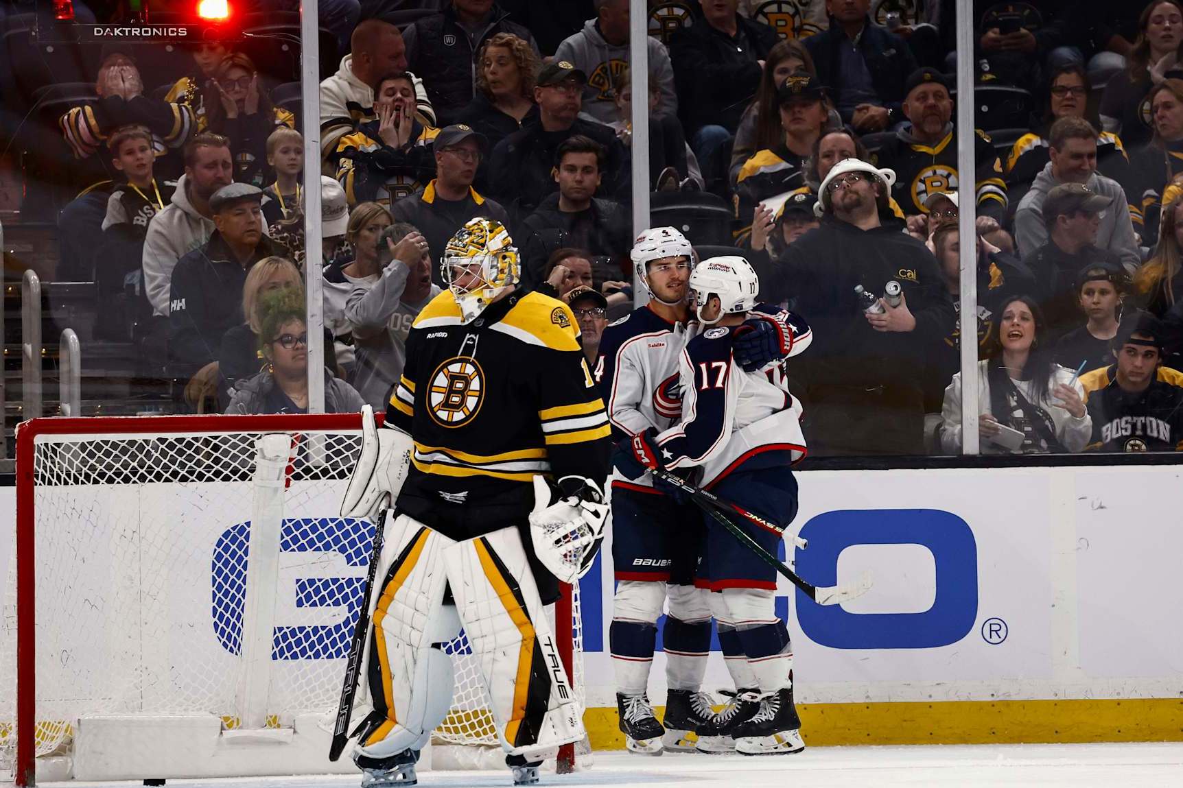 BOSTON, MA - NOVEMBER 18: Justin Danforth (R) #17 of the Columbus Blue Jackets is congratulated by teammate Cole Sillinger #4 after his short-handed goal on goaltender Jeremy Swayman #1 of the Boston Bruins during the third period at TD Garden on November 18, 2024 in Boston, Massachusetts. (Photo By Winslow Townson/Getty Images)