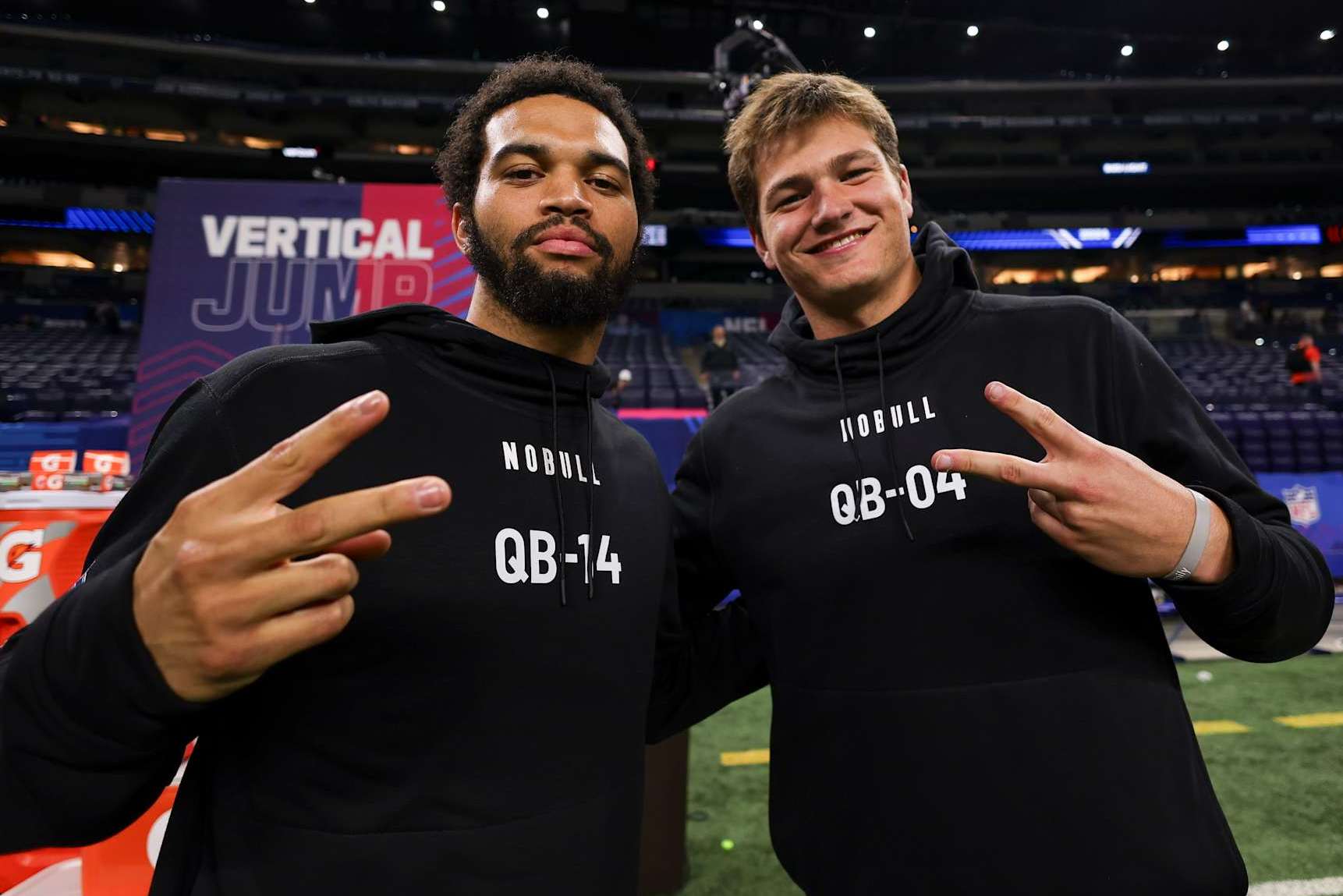 INDIANAPOLIS, INDIANA - MARCH 2: Caleb Williams #QB14 of Southern California takes a picture with Drake Maye #QB04 of North Carolina during the NFL scouting combine at Lucas Oil Stadium on March 2, 2024 in Indianapolis, Indiana. (Photo by Kara Durrette/Getty Images)
