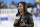 ESPN reporter Lisa Salters works before an NFL football game between the Tennessee Titans and the Buffalo Bills Monday, Oct. 18, 2021, in Nashville, Tenn. (AP Photo/Mark Zaleski)