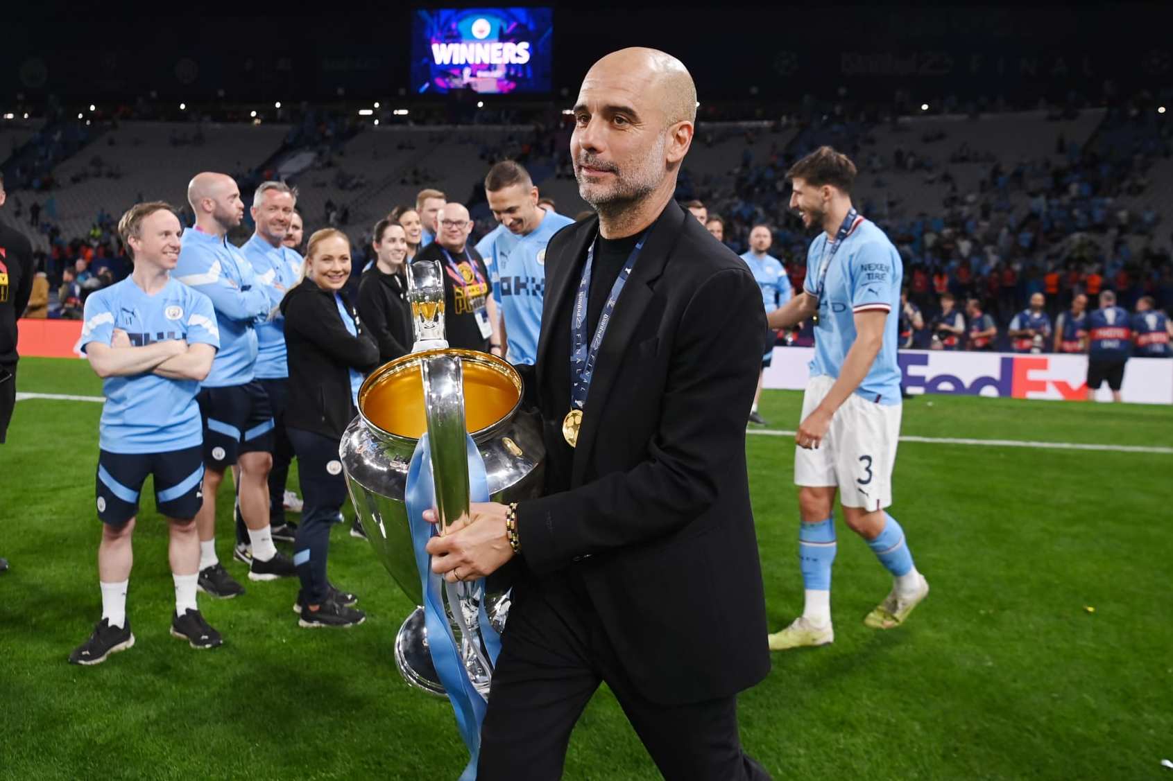ISTANBUL, TURKEY - JUNE 10: Manchester City manager Pep Guardiola with the Champions League Trophy after winning the UEFA Champions League 2022/23 final match between FC Internazionale and Manchester City FC at Atatuerk Olympic Stadium on June 10, 2023 in Istanbul, Turkey. (Photo by Michael Regan - UEFA/UEFA via Getty Images)