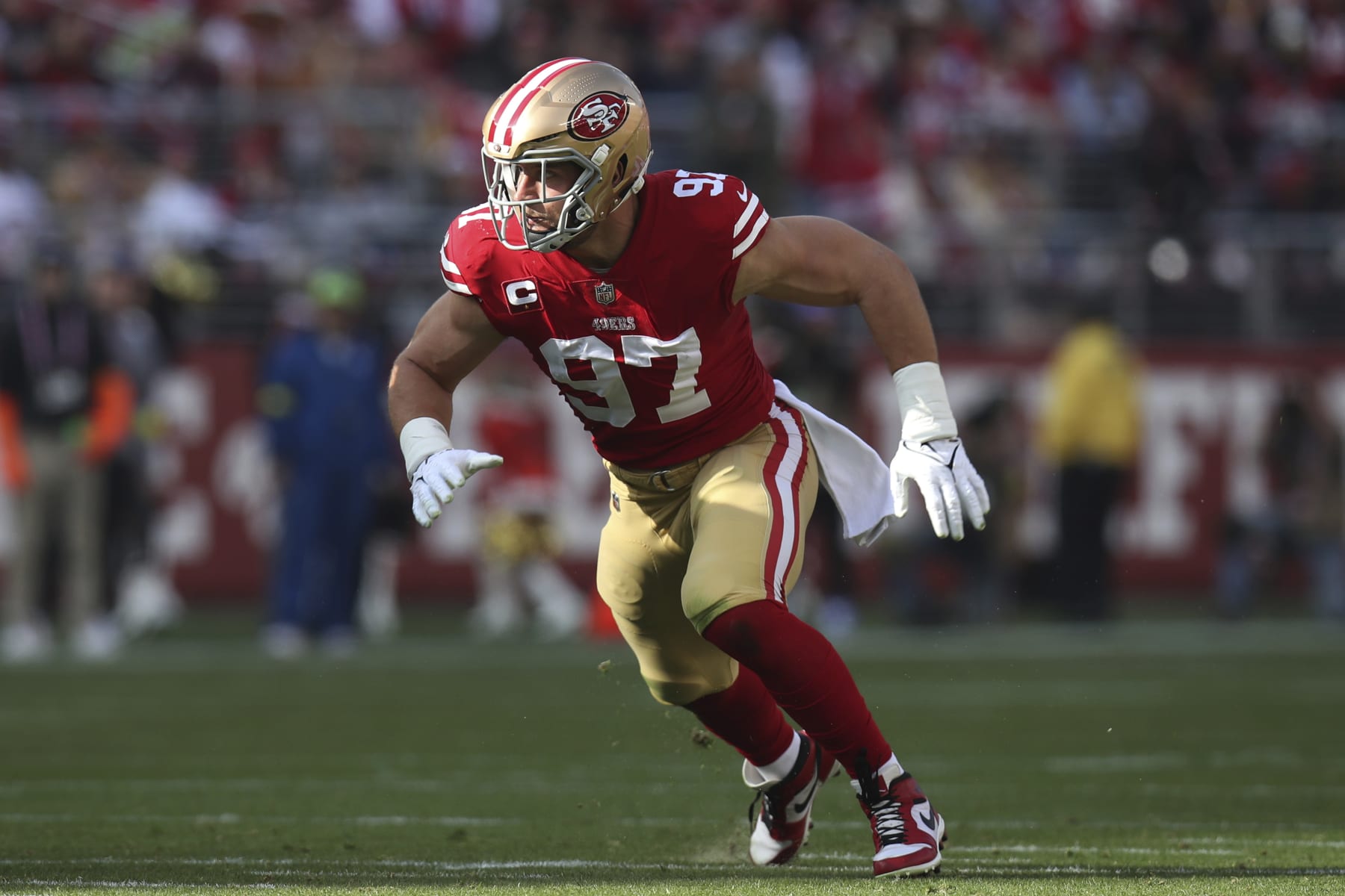 San Francisco 49ers defensive close Prick Bosa (97) rushes after a play for the duration of an NFL soccer game against the Washington Commanders, Sunday, Dec.24, 2022, in Santa Clara, Calif. (AP Photo/Scot Tucker)