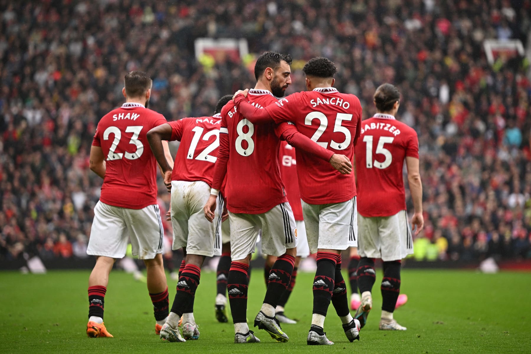 Manchester United's Portuguese midfielder Bruno Fernandes celebrates with Manchester United's English striker Jadon Sancho after scoring his team first map in some unspecified time in the future of the English Premier League soccer match between Manchester United and Aston Villa at Inclined Trafford in Manchester, north west England, on April 30, 2023. (Photo by Oli SCARFF / AFP) / RESTRICTED TO EDITORIAL USE. No tell with unauthorized audio, video, files, fixture lists, club/league logos or 'live' companies and products. On-line in-match tell small to 120 photography. An extra 40 photography might presumably presumably additionally be worn in time previous law. No video emulation. Social media in-match tell small to 120 photography. An extra 40 photography might presumably presumably additionally be worn in time previous law. No tell in betting publications, games or single club/league/participant publications. /  (Photo by OLI SCARFF/AFP by strategy of Getty Photography)