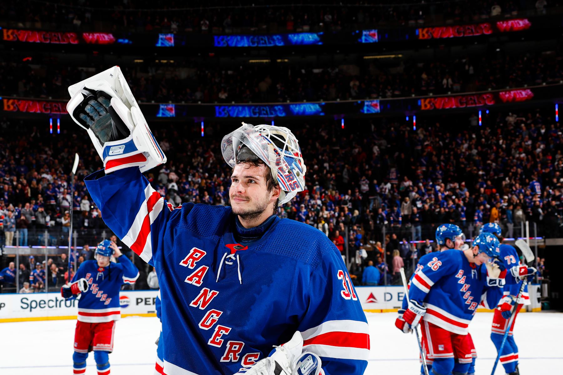 NEW YORK, NEW YORK - APRIL 13:  Igor Shesterkin #31 of the New York Rangers celebrates after a 3-2 shootout win against the New York Islanders at Madison Square Garden on April 13, 2024 in New York City. (Photo by Jared Silber/NHLI via Getty Images)