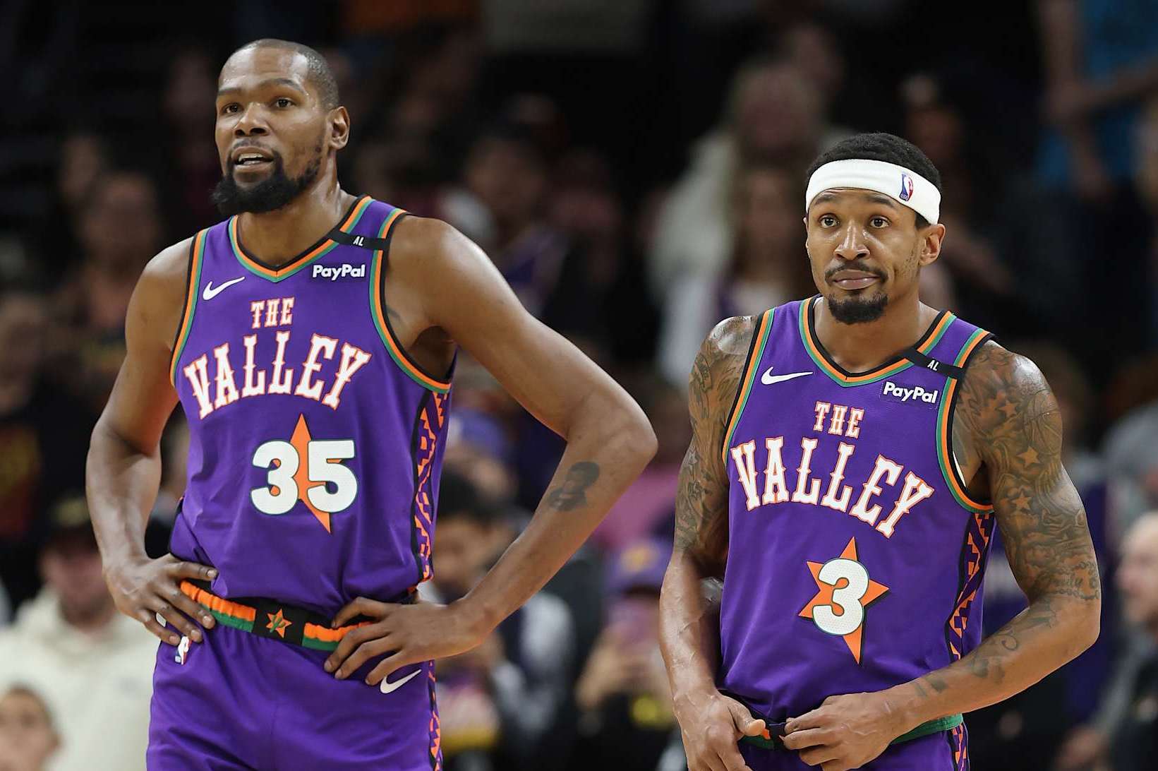 PHOENIX, ARIZONA - JANUARY 12: Kevin Durant #35 and Bradley Beal #3 of the Phoenix Suns during the second half of the NBA game at Footprint Center on January 12, 2025 in Phoenix, Arizona. The Suns defeated the Hornets 120-113. NOTE TO USER: User expressly acknowledges and agrees that, by downloading and or using this photograph, User is consenting to the terms and conditions of the Getty Images License Agreement. (Photo by Christian Petersen/Getty Images)