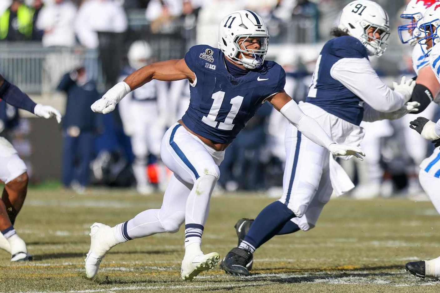 STATE COLLEGE, PA - DECEMBER 21: Abdul Carter #11 of the Penn State Nittany Lions rushes during a game between SMU and Penn State at Beaver Stadium on December 21, 2024 in State College, Pennsylvania. (Photo by Roger Wimmer/ISI Photos/Getty Images)