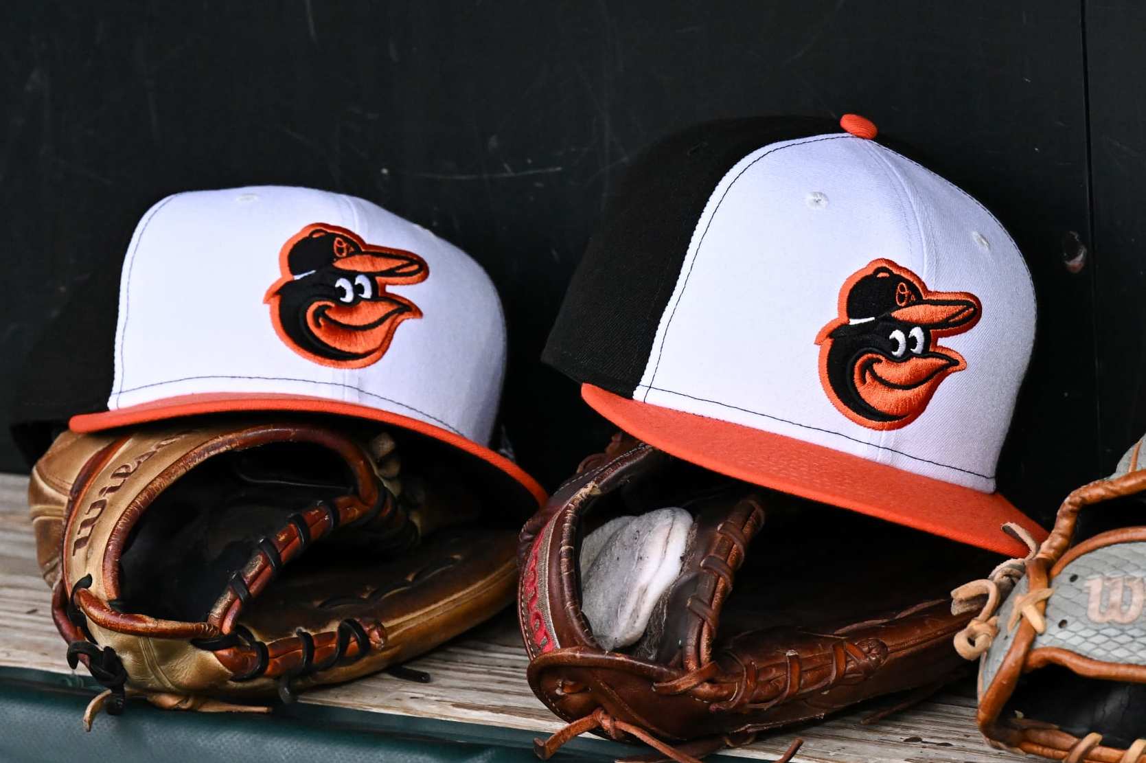 BALTIMORE, MARYLAND - MARCH 30, 2024: A view of Baltimore Orioles hats prior to a game against the Los Angeles Angels at Oriole Park at Camden Yards on March 30, 2024 in Baltimore, Maryland. (Photo by Chris Bernacchi/Diamond Images via Getty Images)