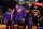 PHOENIX, AZ - NOVEMBER 4: Josh Okogie #2, Devin Booker #1, Chris Paul #3, Deandre Ayton #22, and Mikal Bridges #25 of the Phoenix Suns look on before the game against the Portland Trail Blazers on November 4, 2022 at Footprint Center in Phoenix, Arizona. NOTE TO USER: User expressly acknowledges and agrees that, by downloading and or using this photograph, user is consenting to the terms and conditions of the Getty Images License Agreement. Mandatory Copyright Notice: Copyright 2022 NBAE (Photo by Barry Gossage/NBAE via Getty Images)