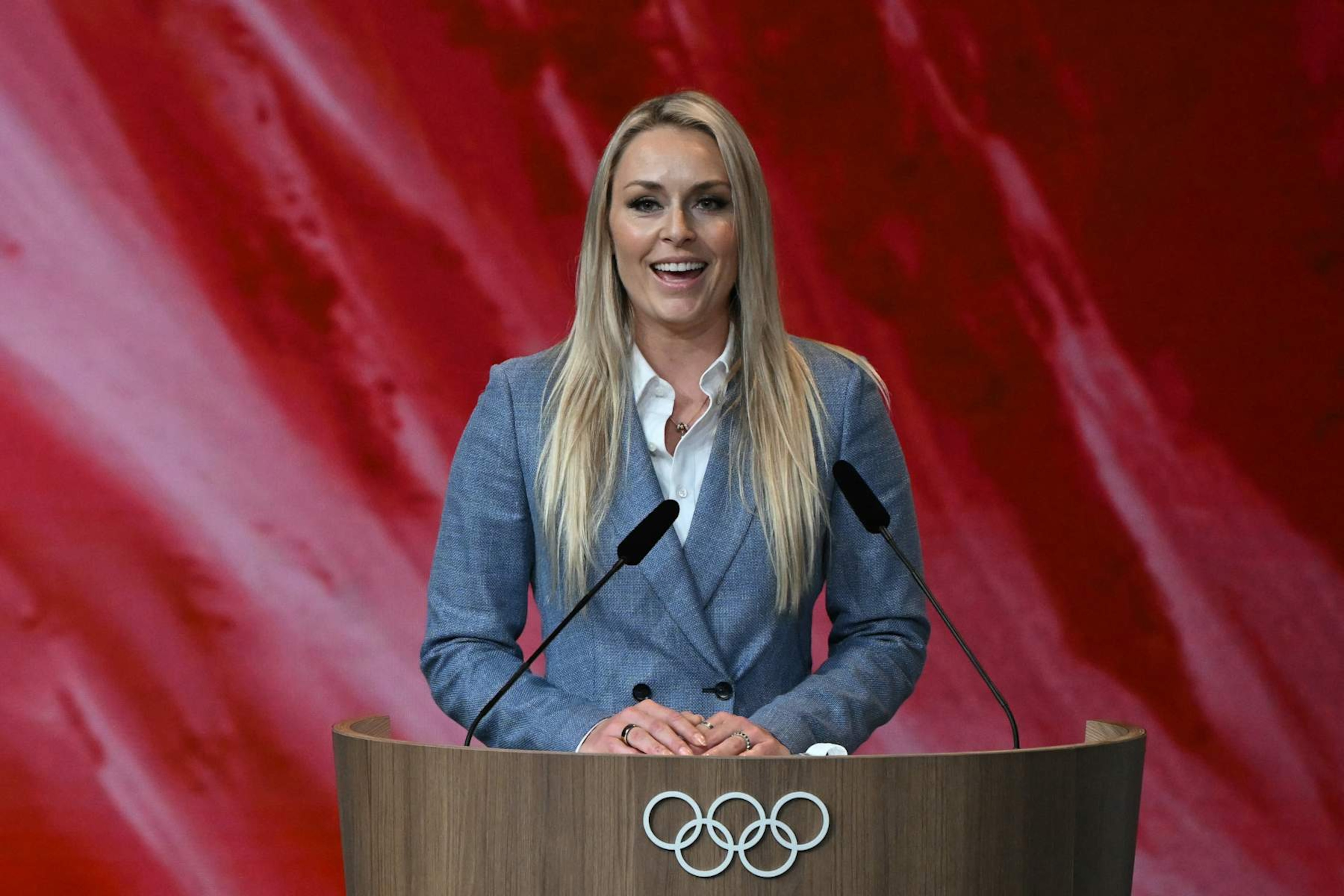 US former alpine skiing champion Lindsey Vonn speaks during the Salt Lake City bid for the 2034 Winter Games during the 142nd session of the International Olympic Committee (IOC) in Paris on July 24, 2024, ahead of the Paris 2024 Olympic Games. (Photo by Fabrice COFFRINI / AFP) (Photo by FABRICE COFFRINI/AFP via Getty Images)