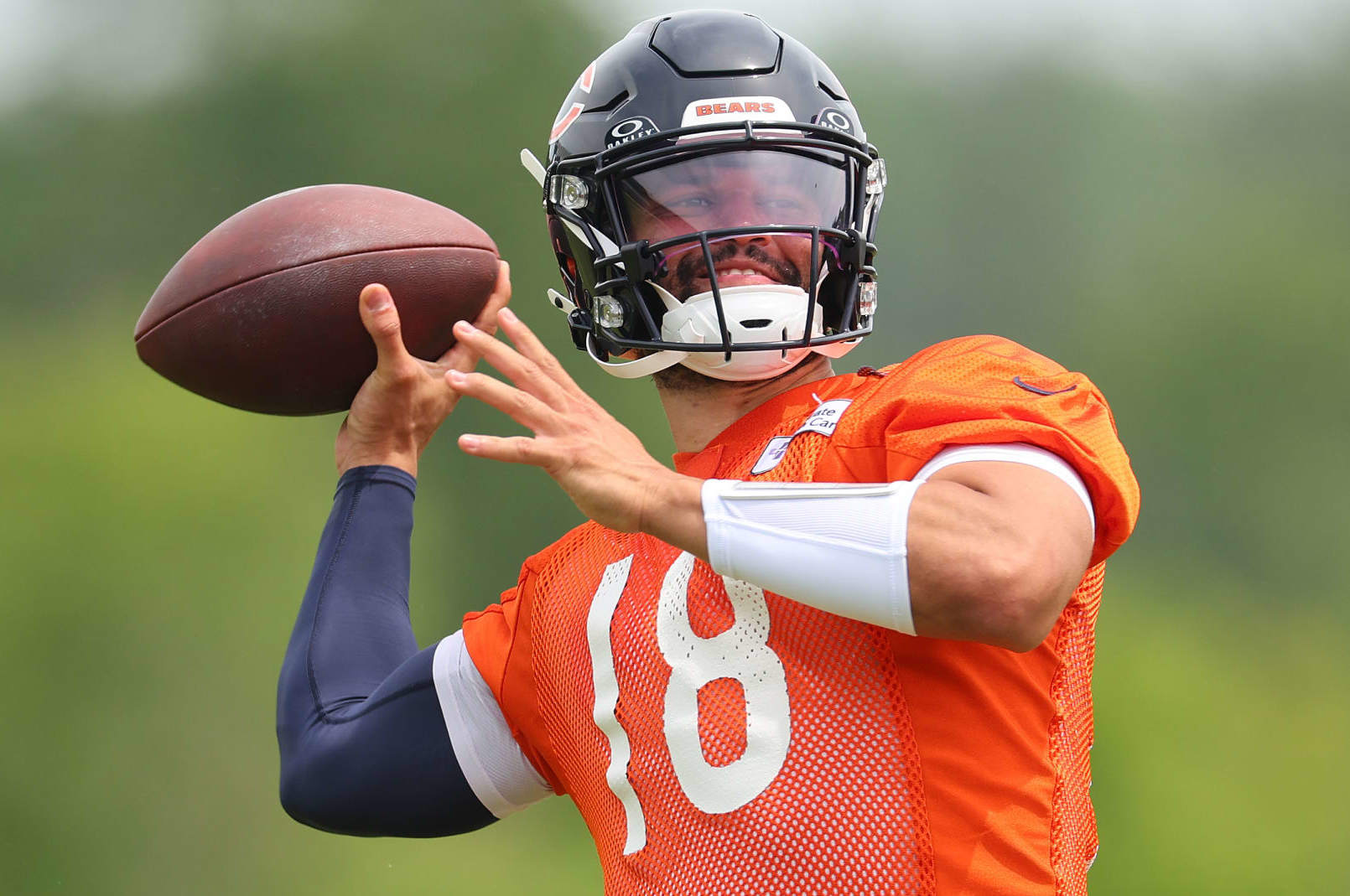 LAKE FOREST, ILLINOIS - JUNE 04: Caleb Williams #18 of the Chicago Bears throws a pass during Chicago Bears Minicamp at Halas Hall on June 04, 2024 in Lake Forest, Illinois. (Photo by Michael Reaves/Getty Images)