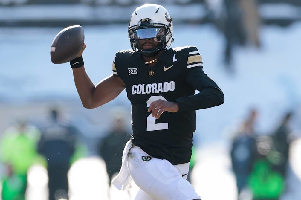 BOULDER, COLORADO - NOVEMBER 29: Shedeur Sanders #2 of the Colorado Buffaloes runs with the ball during the first half against the Oklahoma State Cowboys at Folsom Field on November 29, 2024 in Boulder, Colorado. (Photo by Andrew Wevers/Getty Images)