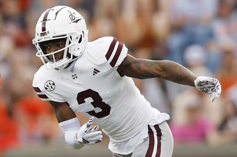 AUBURN, ALABAMA - OCTOBER 28: Caleb Burton III #10 of the Auburn Tigers runs the ball past Decamerion Richardson #3 of the Mississippi State Bulldogs during the first quarter at Jordan-Hare Stadium on October 28, 2023 in Auburn, Alabama. (Photo by Alex Slitz/Getty Images)