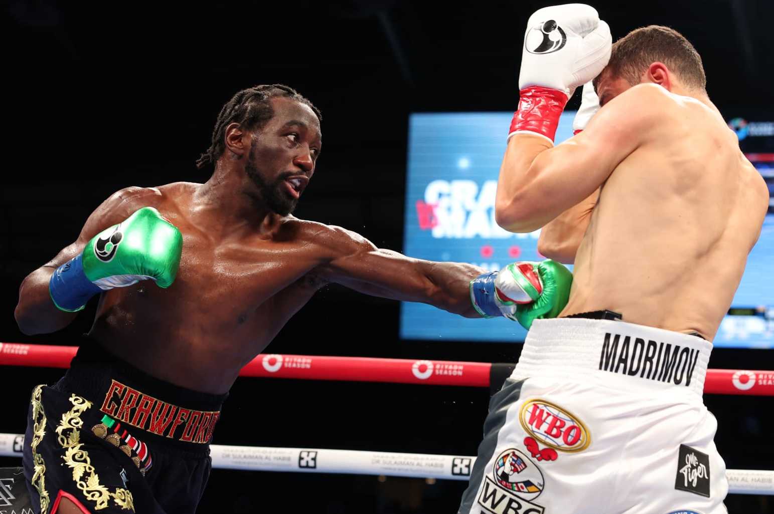 LOS ANGELES, CALIFORNIA - AUGUST 03: Terence Crawford (black and gold shorts) and Israil Madrimov (white shorts) fight during their WBA World Interim WBO World Super Welterweight Title Contest, at BMO Stadium on August 3, 2024 in Los Angeles, California. (Photo by Mark Robinson/Matchroom Boxing/Getty Images)
