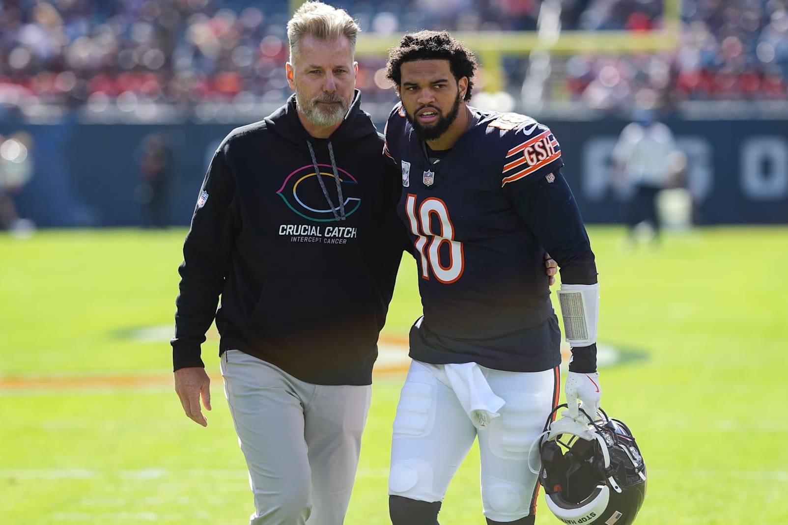 CHICAGO, ILLINOIS - OCTOBER 6: Head coach Matt Eberflus of the Chicago Bears stands on the field with quarterback Caleb Williams #18 prior to an NFL football game against the Carolina Panthers, at Soldier Field on October 6, 2024 in Chicago, Illinois. (Photo by Todd Rosenberg/Getty Images)