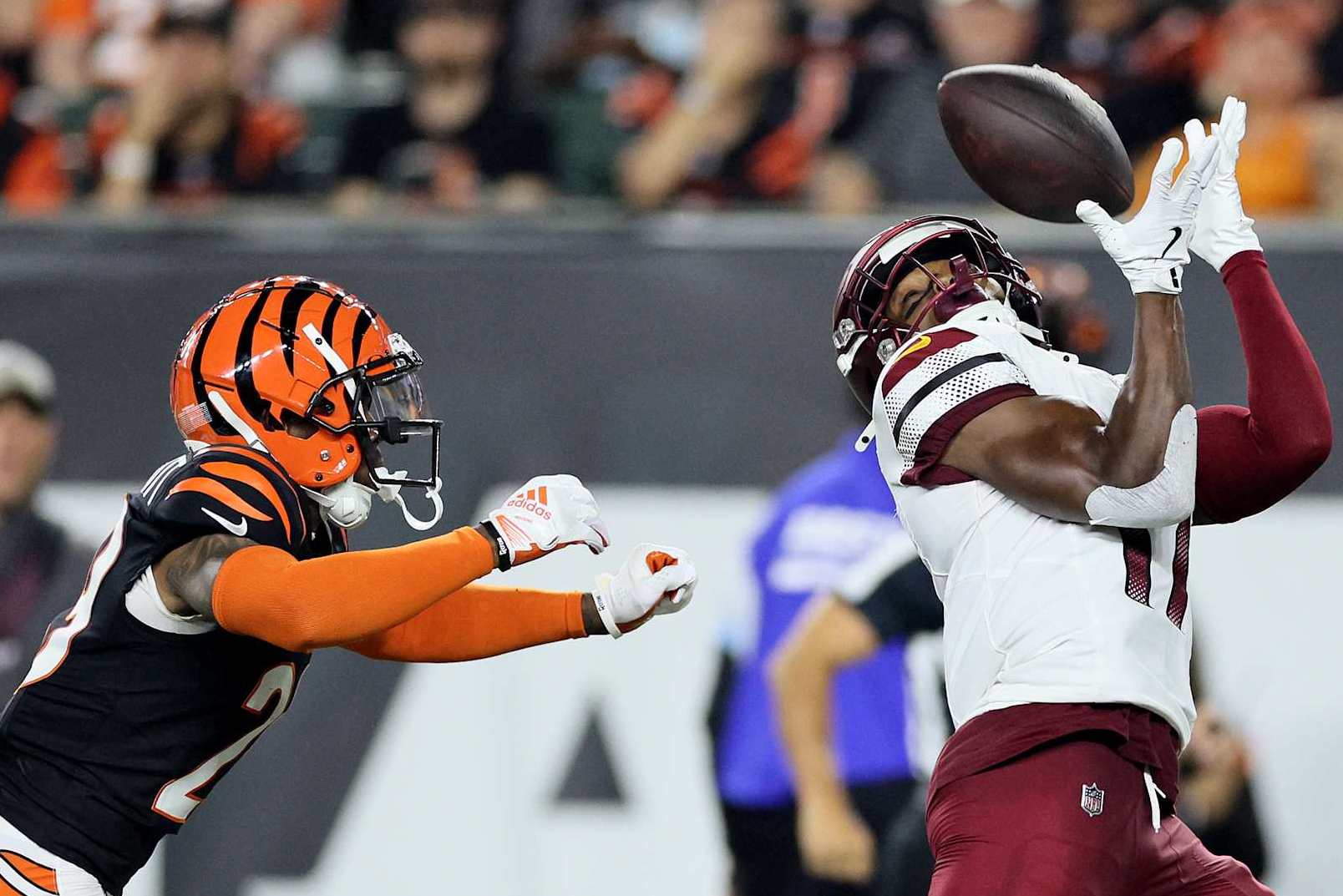 CINCINNATI, OHIO - SEPTEMBER 23: Terry McLaurin #17 of the Washington Commanders catches a 55 yard pass against Cam Taylor-Britt #29 of the Cincinnati Bengals during the second quarter at Paycor Stadium on September 23, 2024 in Cincinnati, Ohio. (Photo by Andy Lyons/Getty Images)