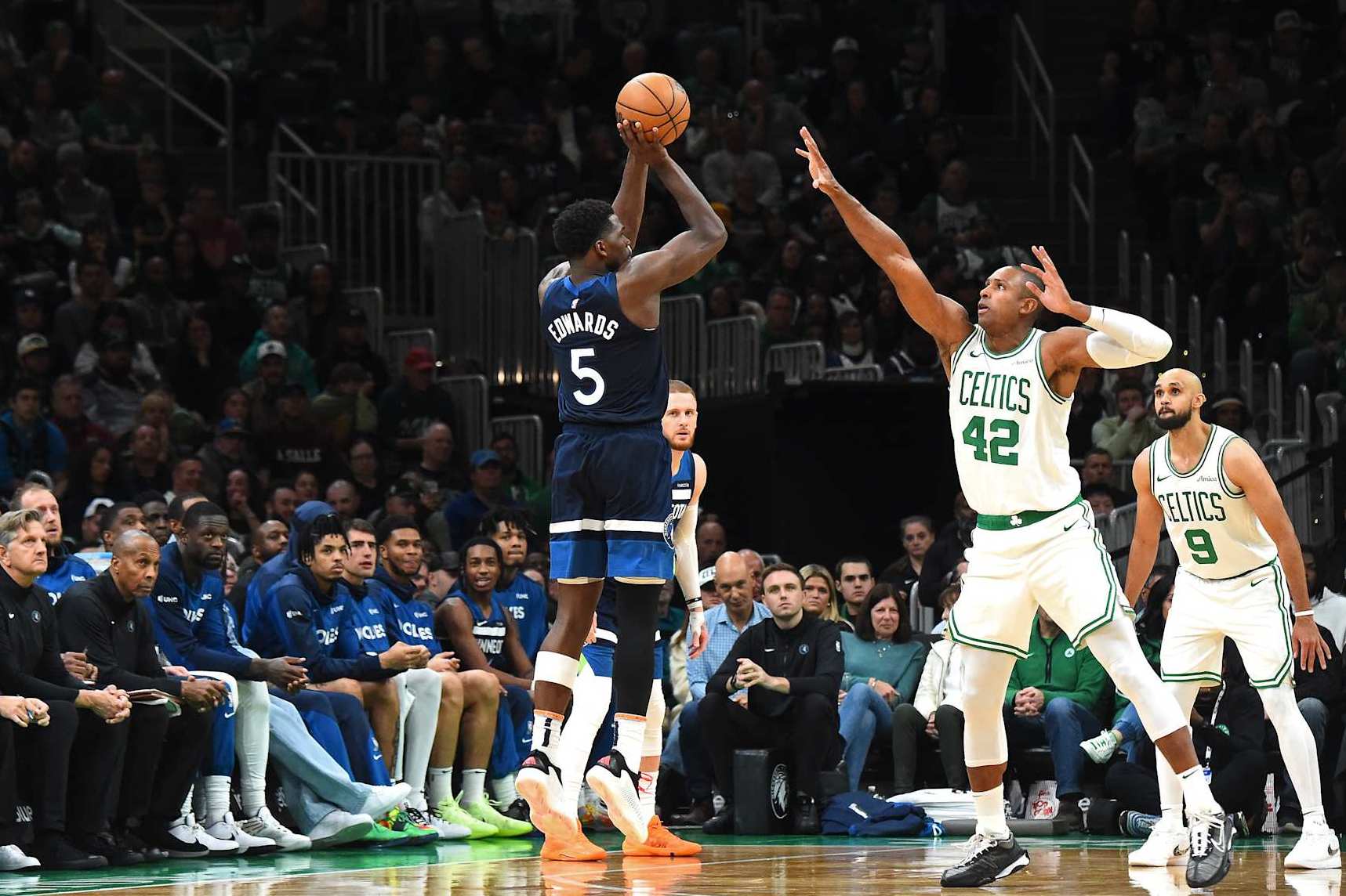 BOSTON, MA - NOVEMBER 24: Anthony Edwards #5 of the Minnesota Timberwolves three point basket during the game against the Boston Celtics on November 24, 2024 at the TD Garden in Boston, Massachusetts. NOTE TO USER: User expressly acknowledges and agrees that, by downloading and or using this photograph, User is consenting to the terms and conditions of the Getty Images License Agreement. Mandatory Copyright Notice: Copyright 2024 NBAE(Photo by Brian Babineau/NBAE via Getty Images)