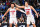 DETROIT, MI - OCTOBER 19: Cade Cunningham #2 and Bojan Bogdanovic #44 of the Detroit Pistons reacts to a play during the game against the Orlando Magic on October 19, 2022 at Little Caesars Arena in Detroit, Michigan. NOTE TO USER: User expressly acknowledges and agrees that, by downloading and/or using this photograph, User is consenting to the terms and conditions of the Getty Images License Agreement. Mandatory Copyright Notice: Copyright 2022 NBAE (Photo by Chris Schwegler/NBAE via Getty Images)