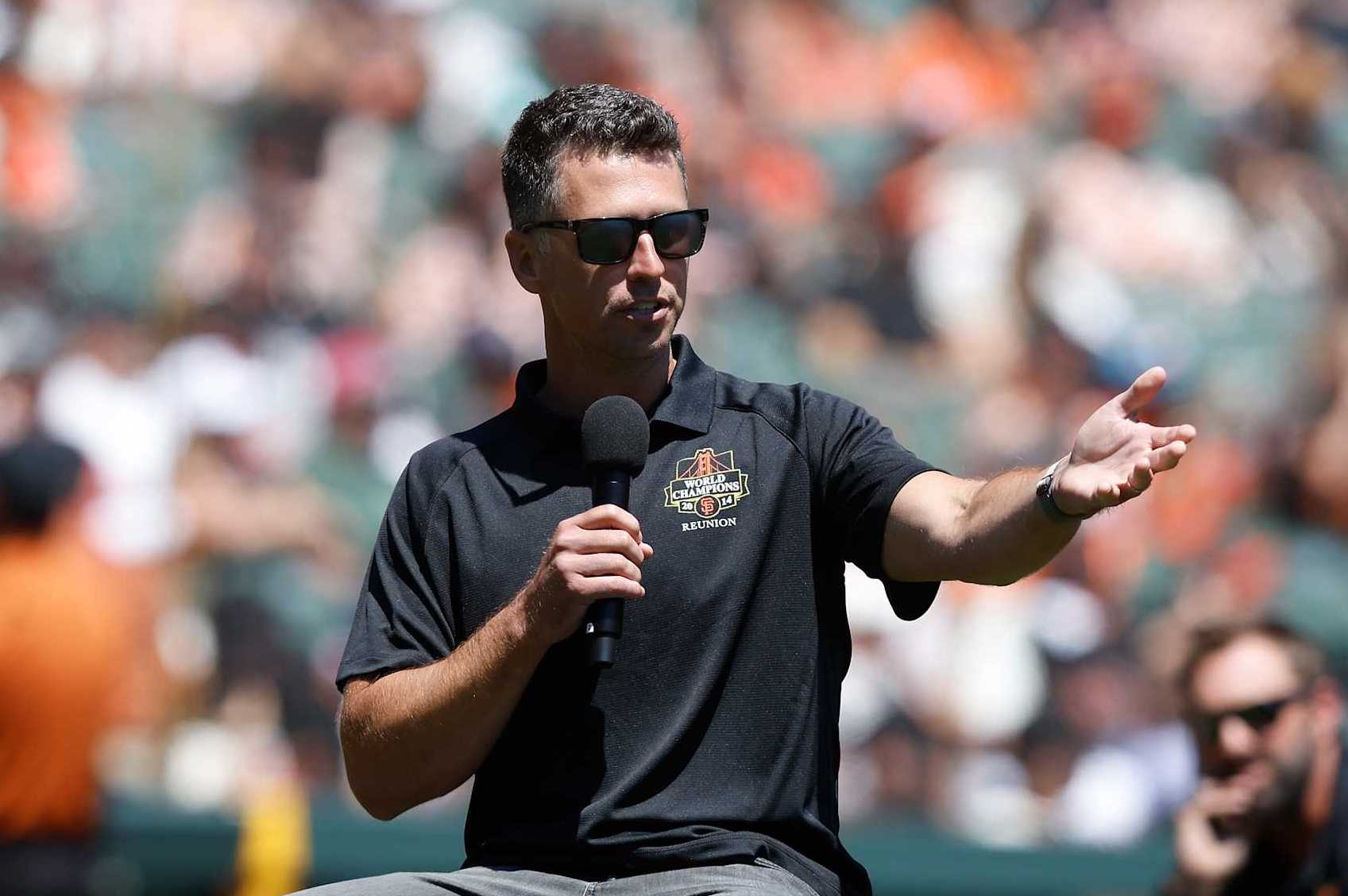 SAN FRANCISCO, CALIFORNIA - AUGUST 10: Former San Francisco Giants player Buster Posey addresses the crowd during the 2014 World Series Reunion ceremony before the game between the San Francisco Giants and the Detroit Tigers at Oracle Park on August 10, 2024 in San Francisco, California. (Photo by Lachlan Cunningham/Getty Images)