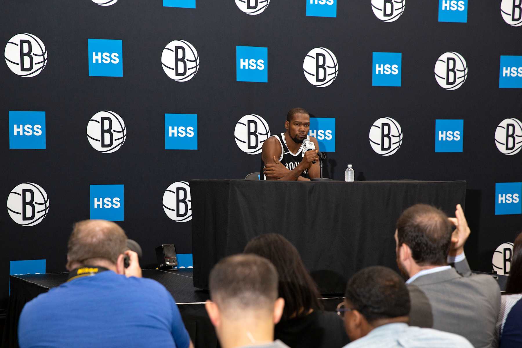 BROOKLYN, NY - SEPTEMBER 27: Kyrie Irving #11 of the Brooklyn Nets talks to the media during a press conference at Media Day on September 27, 2019 at HSS Training Center in Brooklyn, New York. NOTE TO USER: User expressly acknowledges and agrees that, by downloading and/or using this photograph, user is consenting to the terms and conditions of the Getty Images License Agreement. Mandatory Copyright Notice: Copyright 2019 NBAE (Photo by Jeyhoun Allebaugh/NBAE via Getty Images)