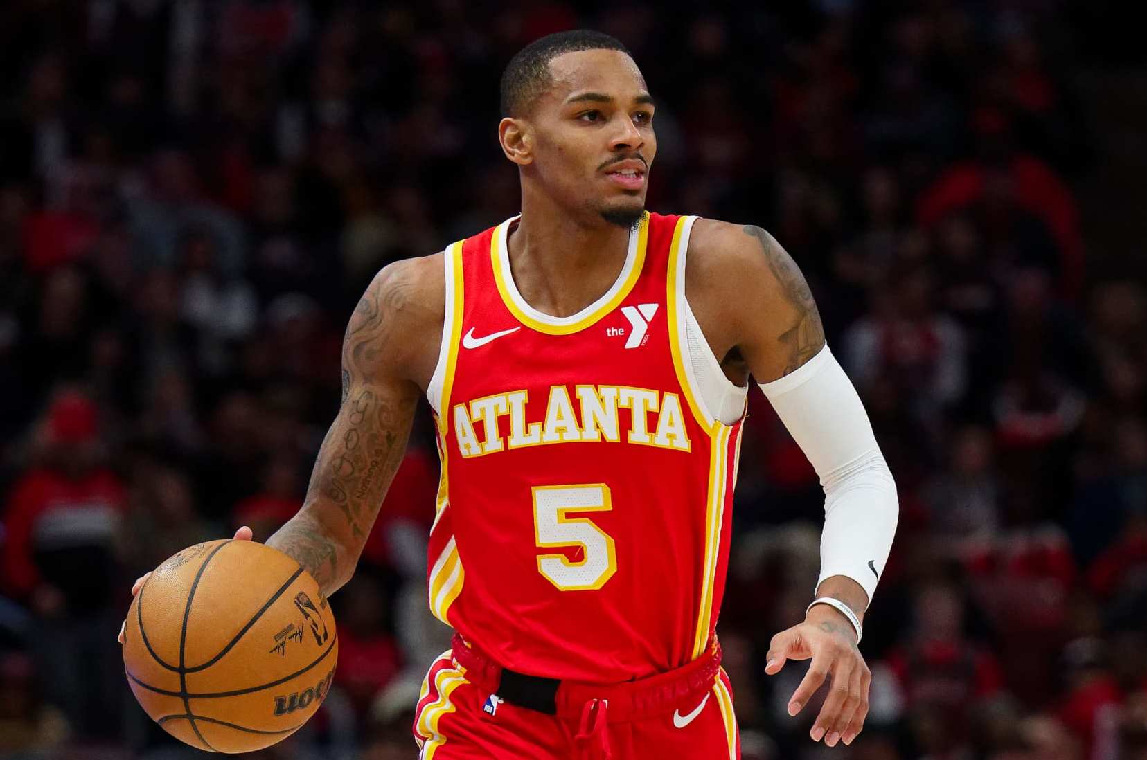 CHICAGO, ILLINOIS - DECEMBER 26: Dejounte Murray #5 of the Atlanta Hawks controls the ball against the Chicago Bulls on December 26, 2023 at United Center in Chicago, Illinois. NOTE TO USER: User expressly acknowledges and agrees that, by downloading and or using this photograph, User is consenting to the terms and conditions of the Getty Images License Agreement. (Photo by Jamie Sabau/Getty Images)