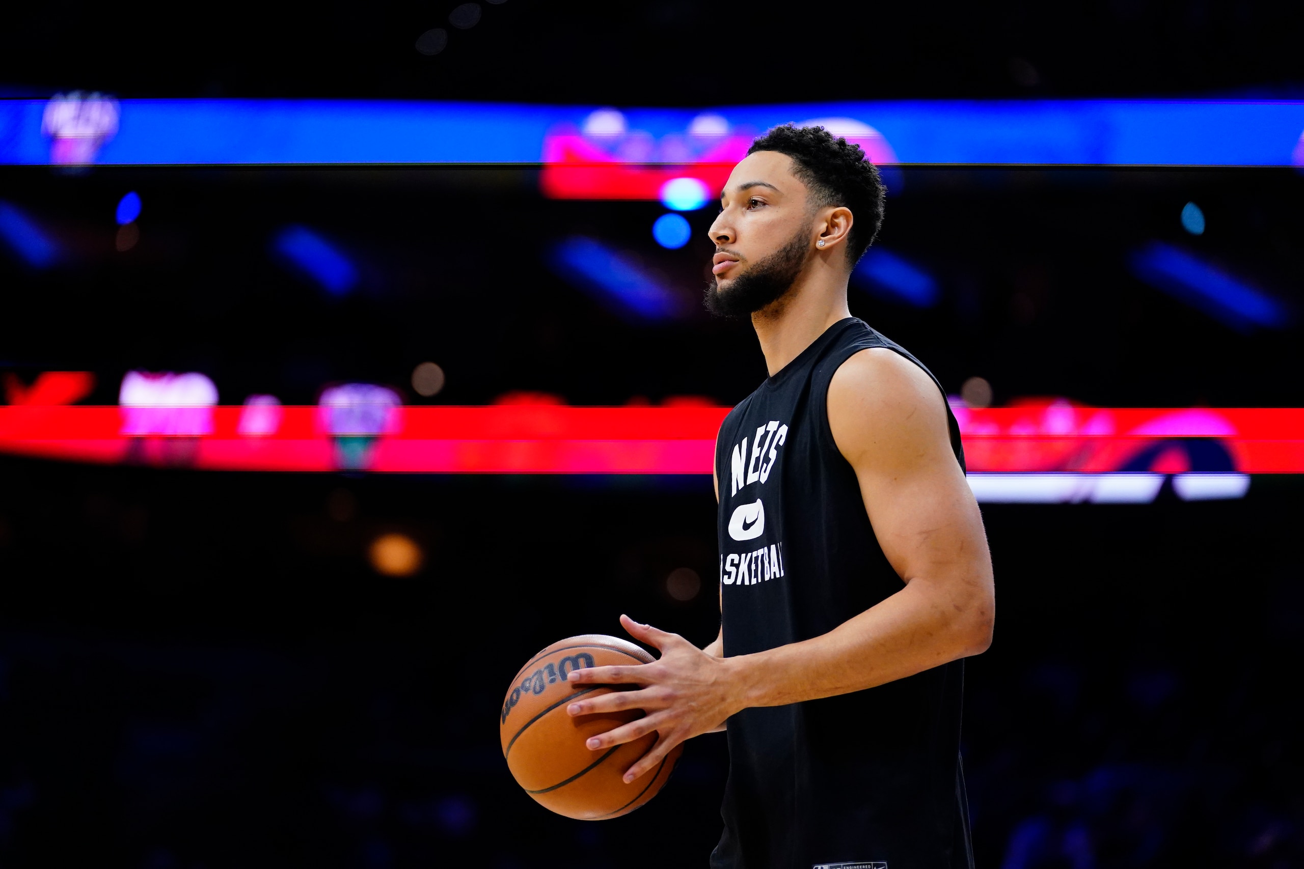 Brooklyn Nets' Ben Simmons watches practice before an NBA basketball game, Thursday, March 10, 2022, in Philadelphia. (AP Photo/Matt Slocum)
