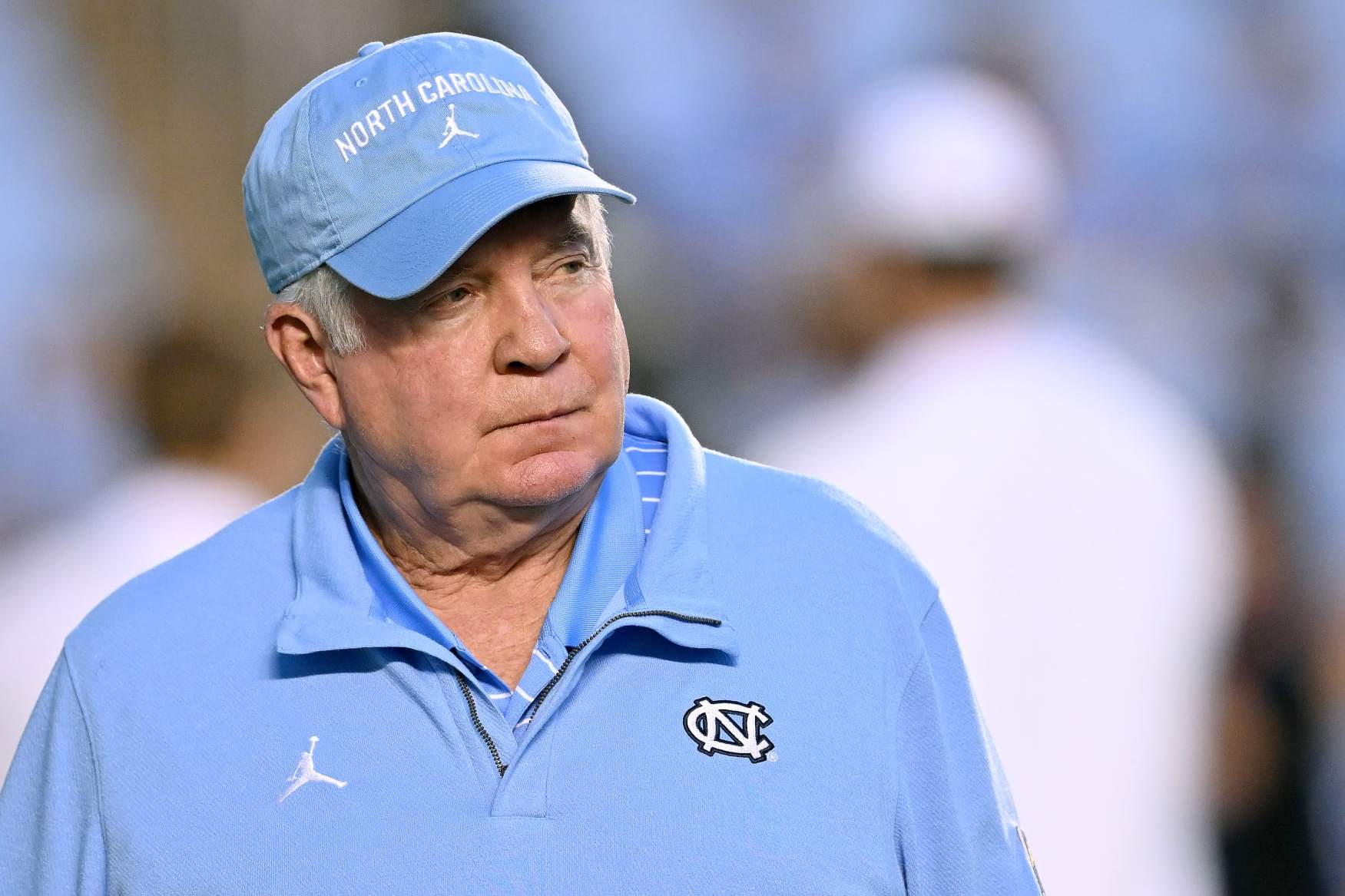CHAPEL HILL, NORTH CAROLINA - AUGUST 27: Head coach Mack Brown of the North Carolina Tar Heels watches his team warm up before their game against the Florida A&M Rattlers at Kenan Memorial Stadium on August 27, 2022 in Chapel Hill, North Carolina. (Photo by Grant Halverson/Getty Images)