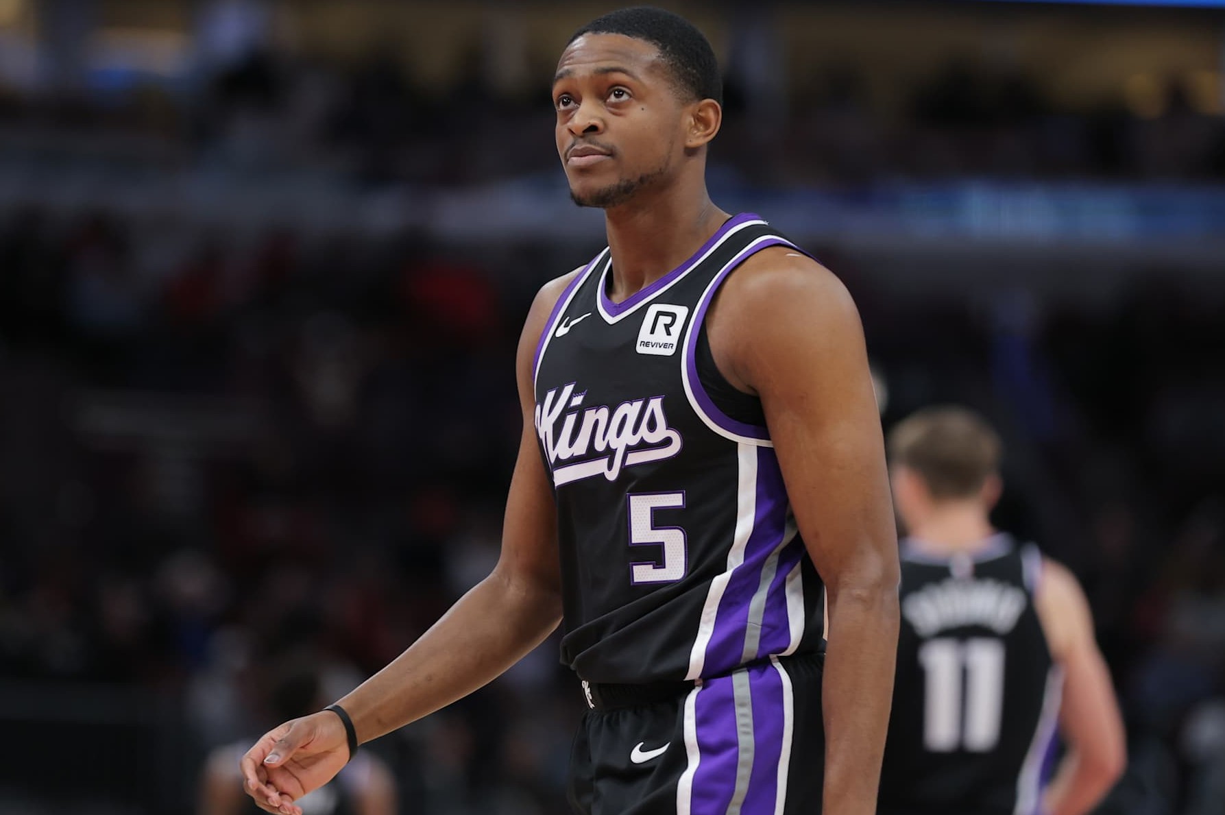 CHICAGO, IL - JANUARY 12: De'Aaron Fox #5 of the Sacramento Kings looks on during the first half against the Chicago Bulls on January 12, 2025 at the United Center in Chicago, Illinois. (Photo by Melissa Tamez/Icon Sportswire via Getty Images)