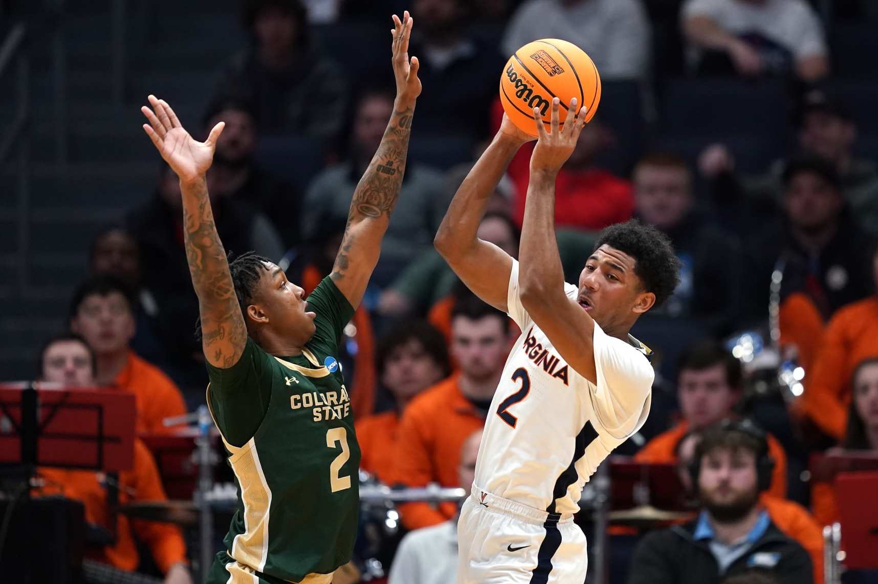 DAYTON, OHIO - MARCH 19: Taviontae Jackson #2 of the Colorado State Rams defends against Reece Beekman #2 of the Virginia Cavaliers during the second half in the First Four game during the NCAA Men's Basketball Tournament at University of Dayton Arena on March 19, 2024 in Dayton, Ohio. (Photo by Dylan Buell/Getty Images)